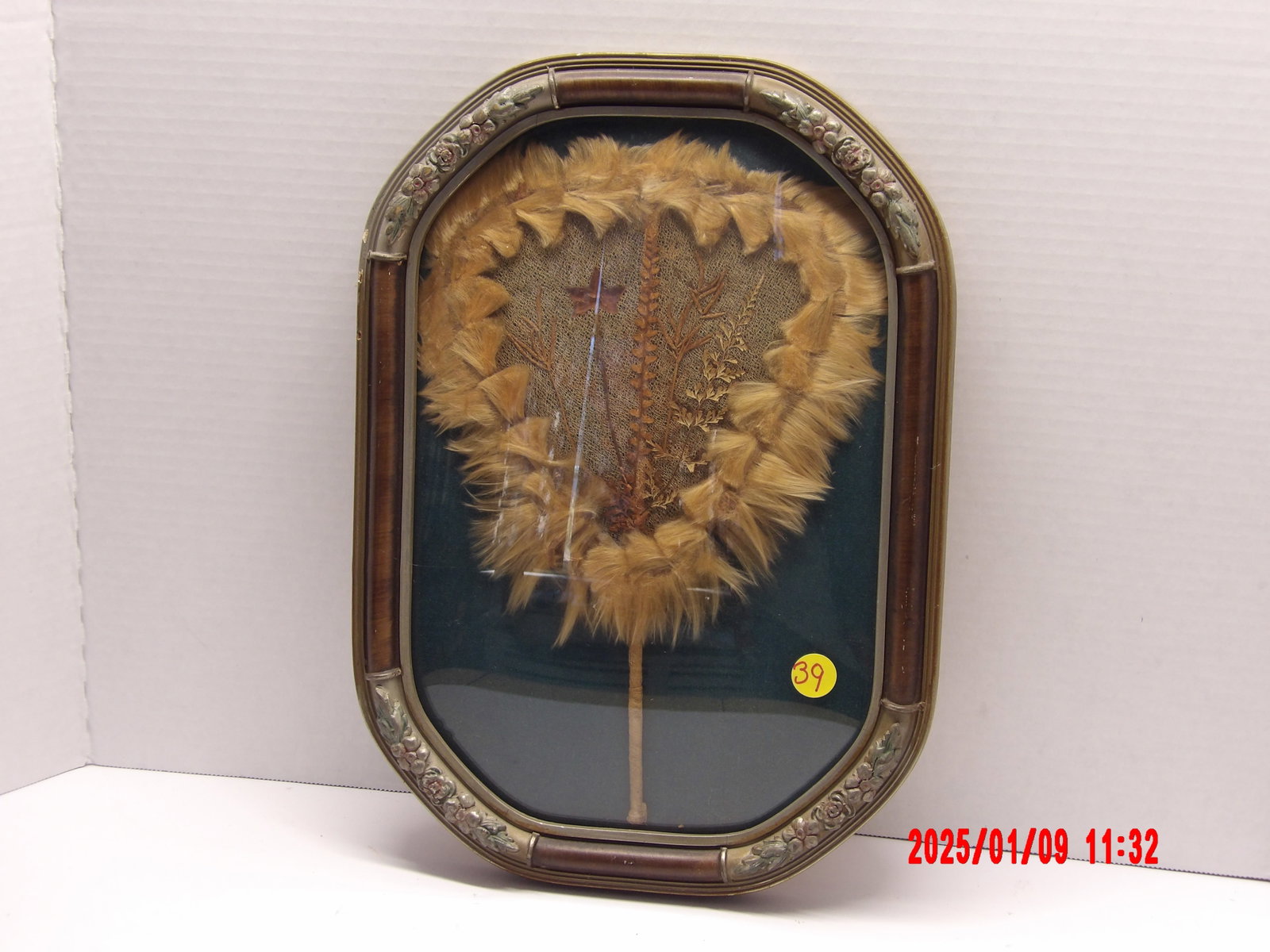 Antique Victorian Flapper Feather: Oval framed floral designed frame