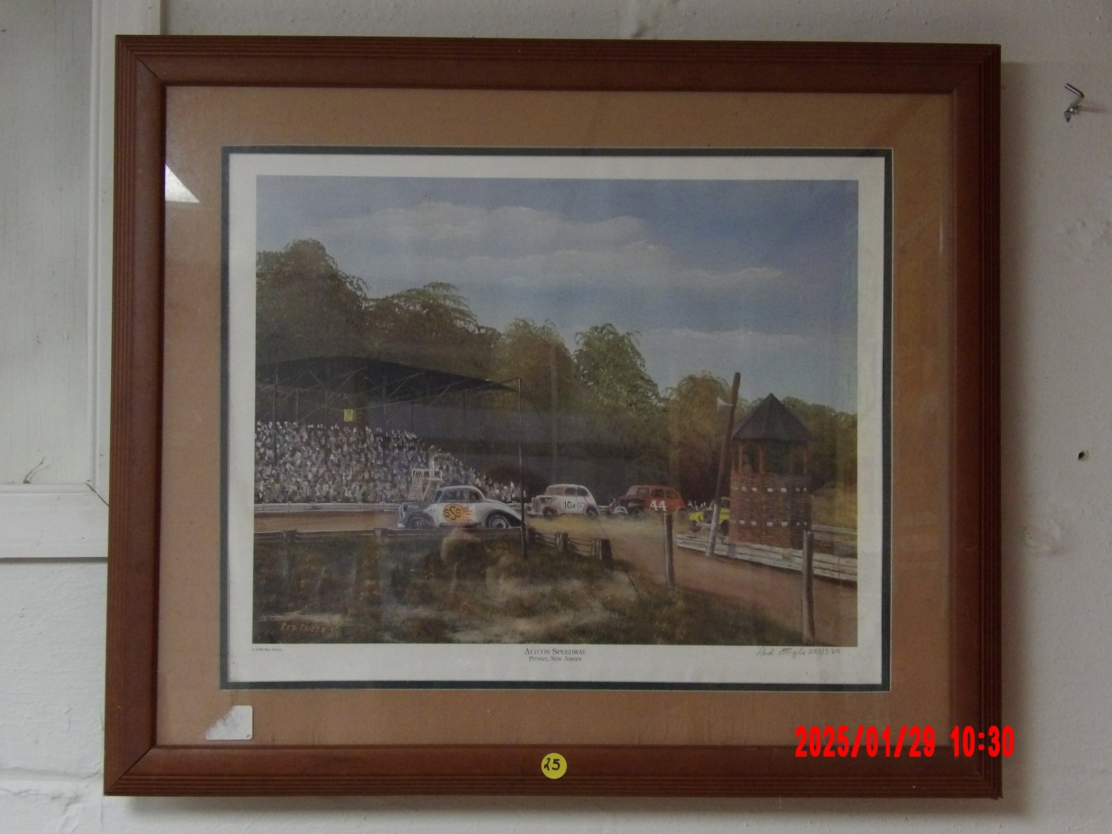 "Alcyon Speedway, Pitman, New Jersey" - Framed Racing Art Print (23" x 27"): This framed print captures a historic racing scene at Alcyon Speedway in Pitman, New Jersey. The artwork depicts a vintage stock car race in action, set in a nostalgic atmosphere with a large crowd, i