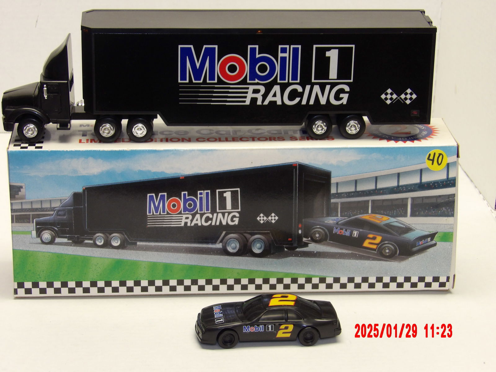 Mobil 1 Racing Toy Race Car Carrier w/ Race Car – Limited Edition Collectors Series: This Mobil 1 Racing Toy Race Car Carrier set is a collector's item, likely aimed at motorsports enthusiasts and racing fans. The matching semi-truck and race car combination adds realism, making it su