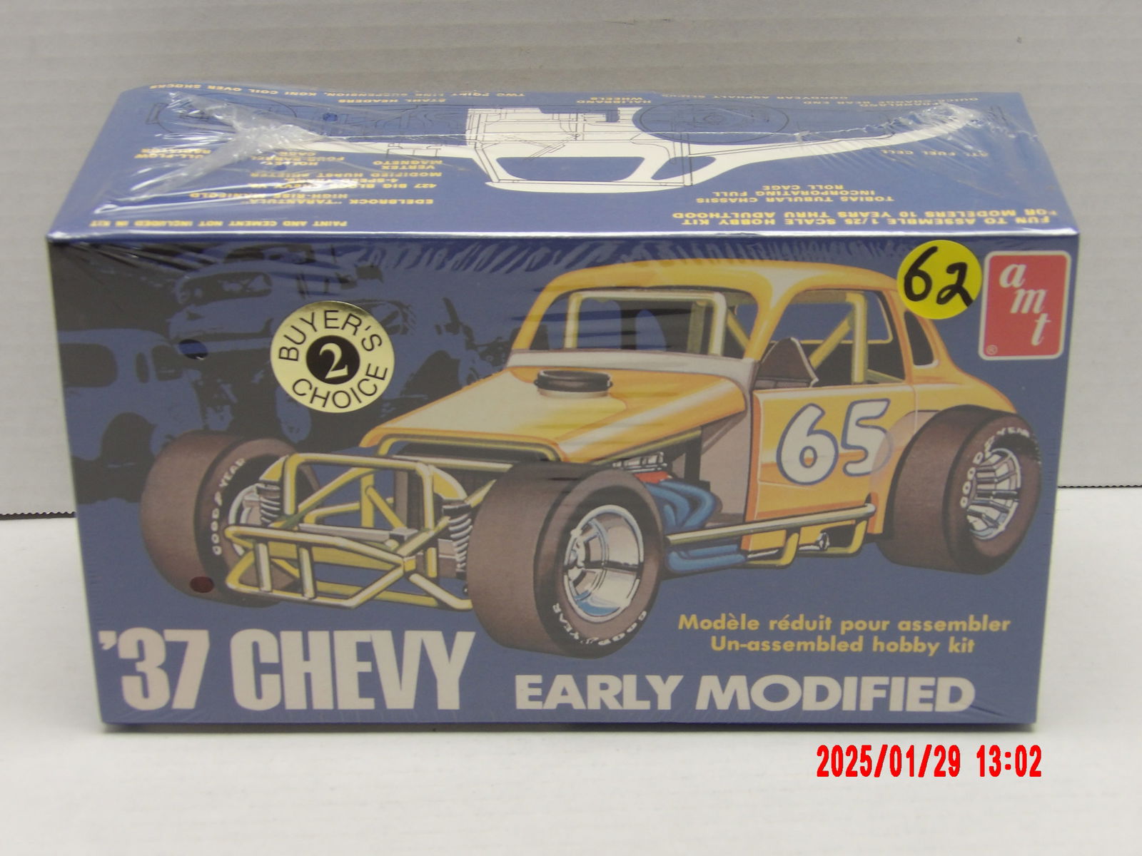 Vintage AMT '37 Chevy Early Modified Model Kit - Collector's Item: The AMT '37 Chevy Early Modified Model Kit is a 1/25 scale plastic model kit designed for enthusiasts who enjoy assembling and customizing vintage racing cars. Factory-sealed kits like this are highly