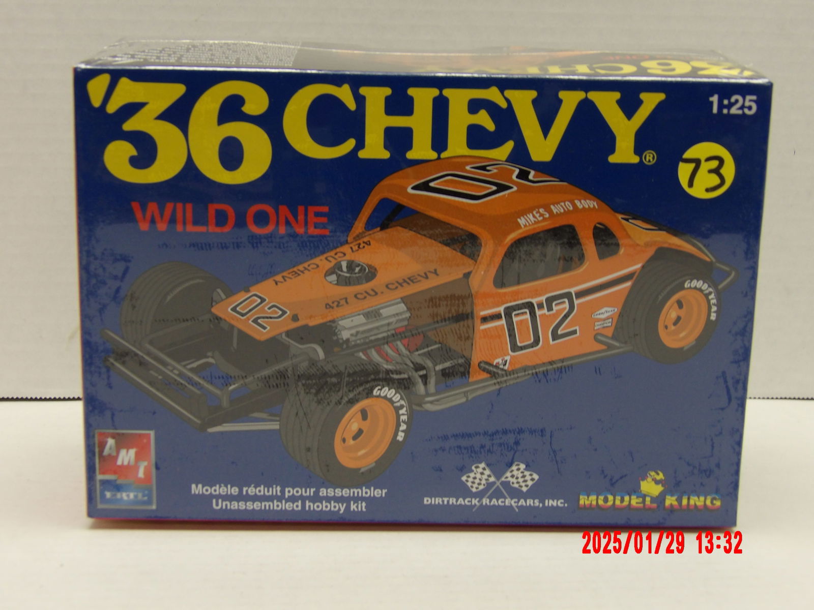 AMT Ertl '36 Chevy Wild One 1:25 Scale Model Kit – Unassembled Hobby Kit: This AMT Ertl '36 Chevy Wild One model kit is a highly detailed representation of a classic dirt track race car, perfect for enthusiasts who appreciate vintage stock car racing. The kit contains every