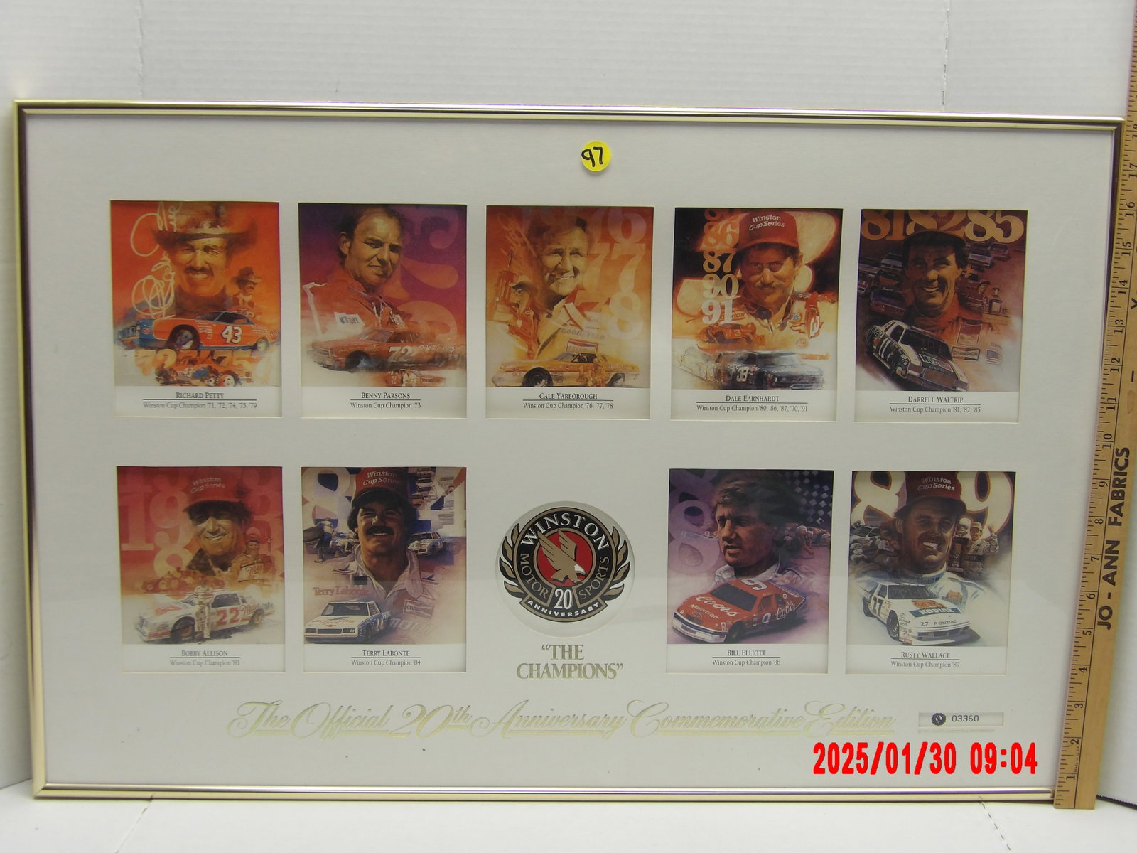 "The Champions – Official 20th Anniversary Commemorative Edition" (24"x36"): This framed (24"x36") collectible piece celebrates the 20th anniversary of the Winston Cup Series, featuring illustrated portraits of legendary NASCAR champions. The display showcases ten iconic drive