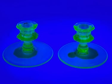 Pair of Uranium Glass Candlesticks with Red Taper Candles