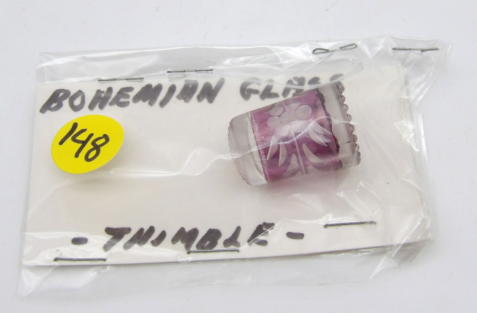 BOHEMIAN GLASS THIMBLE: This collectible Bohemian glass thimble is known for its intricate designs and high quality. This is in ‘cut to clear’ style, and is very desirable to collectors.