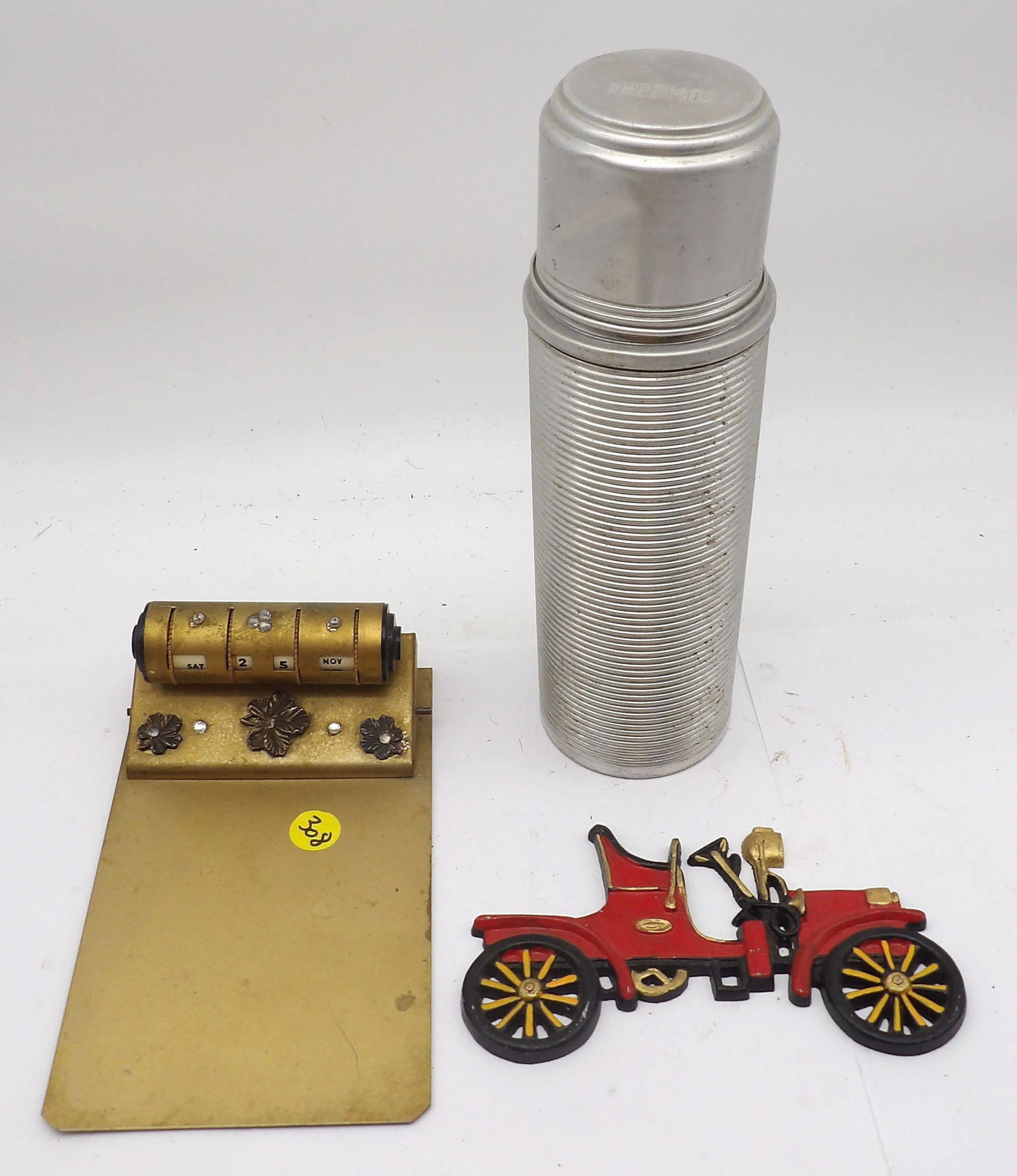 3 PC - DESK CALENDAR CLIPBOARD, METAL THERMOS, CAST IRON MODEL T PLAQUE (1 of 2)