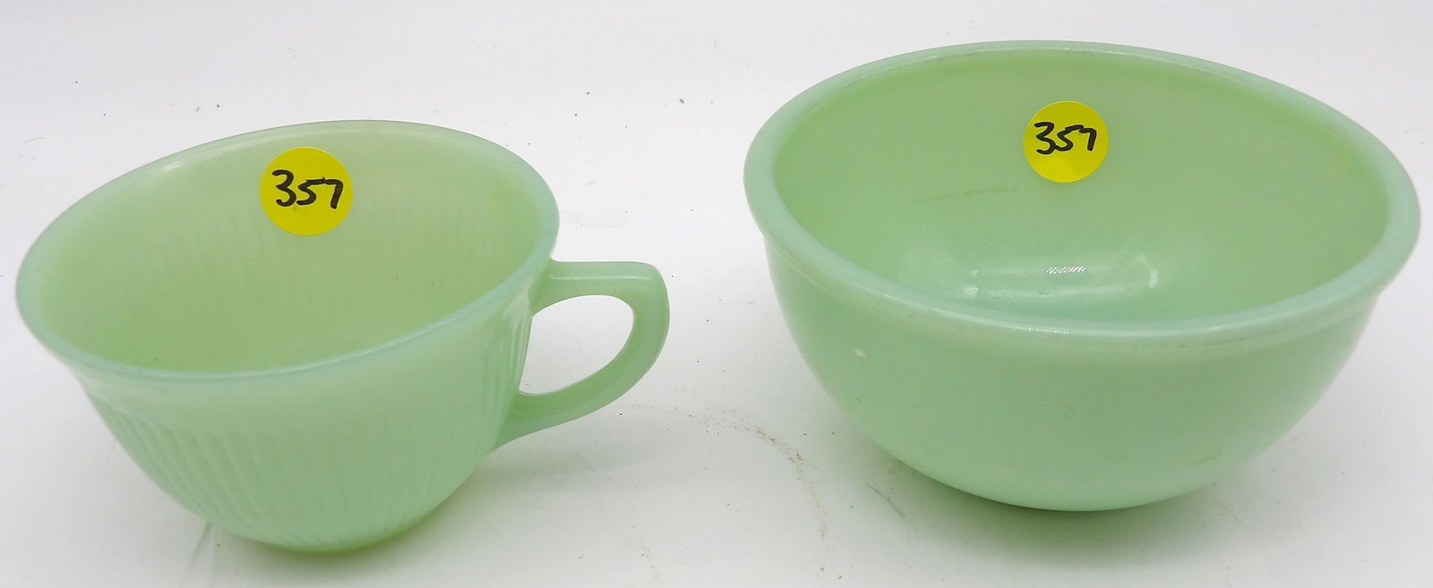FIRE KING JADEITE BOWL & TEACUP: This very collectible Fire King Jadeite kitchenware is Jade Green Opaque Milk Glass, and includes a Jane Ray pattern cup and serving bowl.