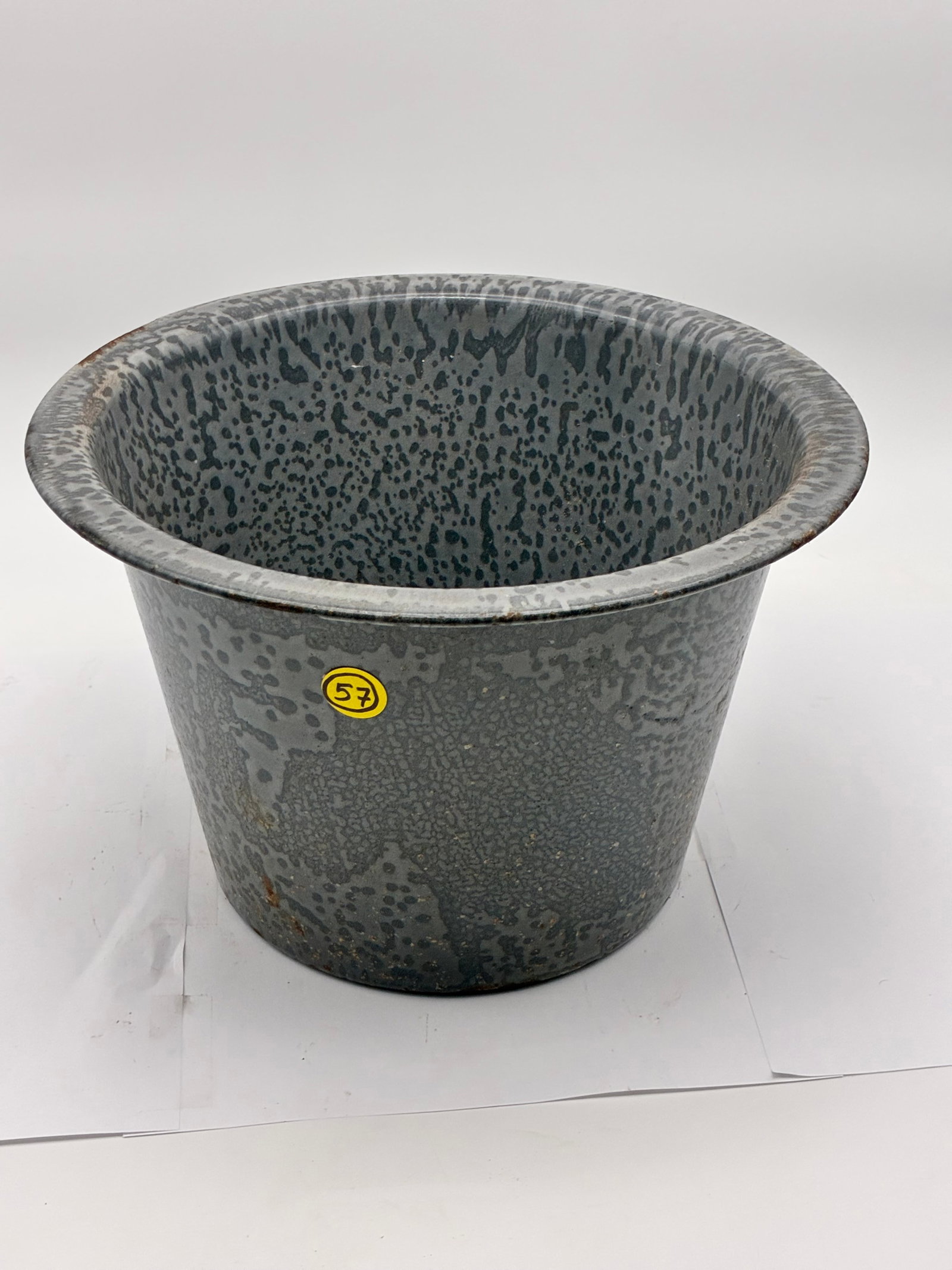 MOTTLED NURSERY POT: This vintage nursery pot features a flared rim and slightly tapered body. It has a mottled (speckled) pattern and is usually used for both indoor and outdoor plants.