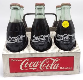 VINTAGE COKE BOTTLES (6) IN METAL CARRIER