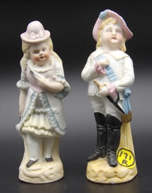 BISQUE PORCELAIN FIGURINE PAIR