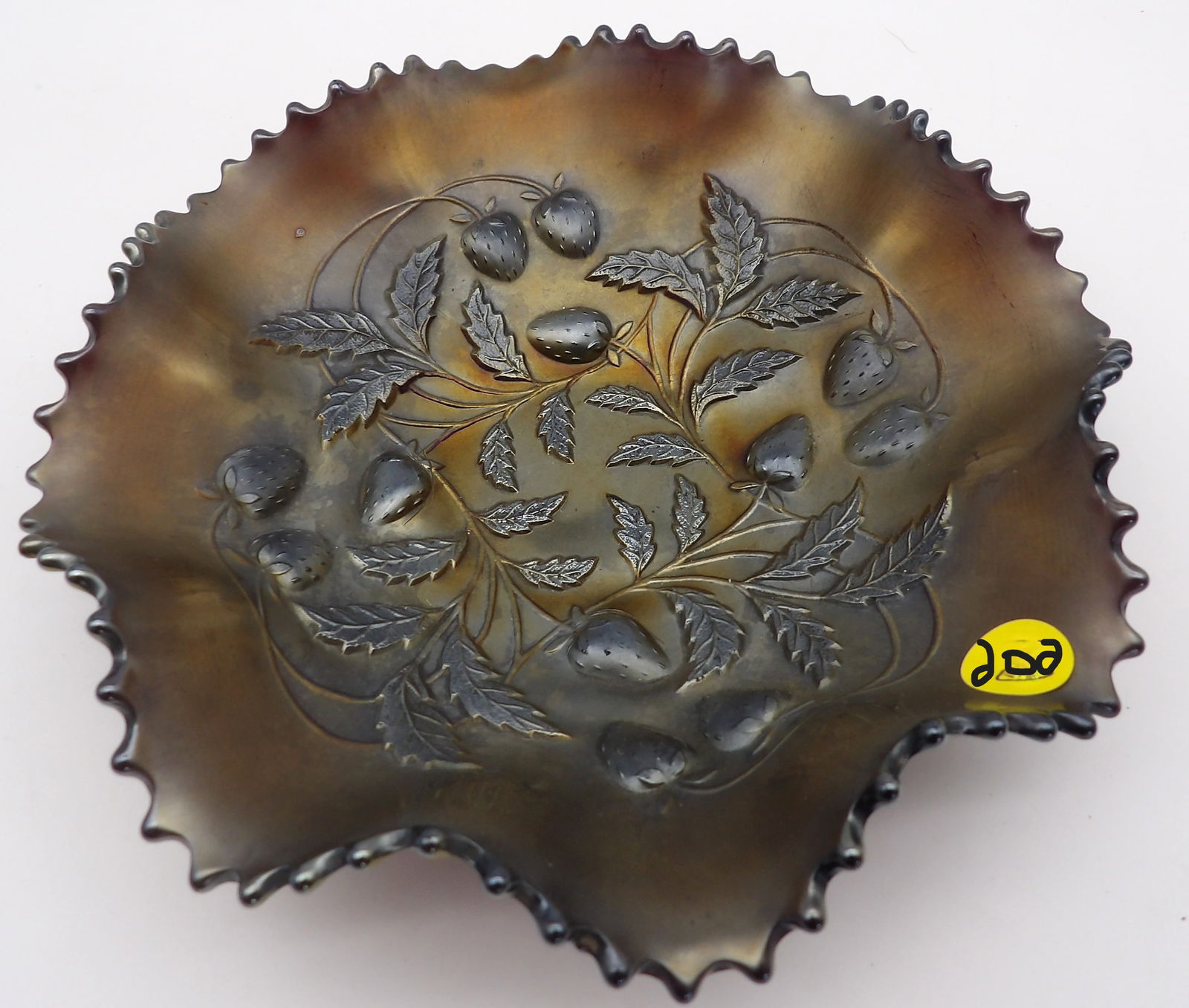 STRAWBERRY RUFFLED AMETHYST GLASS BOWL BY NORTHWOOD GLASS CO.: The Strawberry pattern is one of Northwood’s more desirable fruit motifs, often produced in amethyst, cobalt, and marigold. The basketweave exterior is typical for this line.