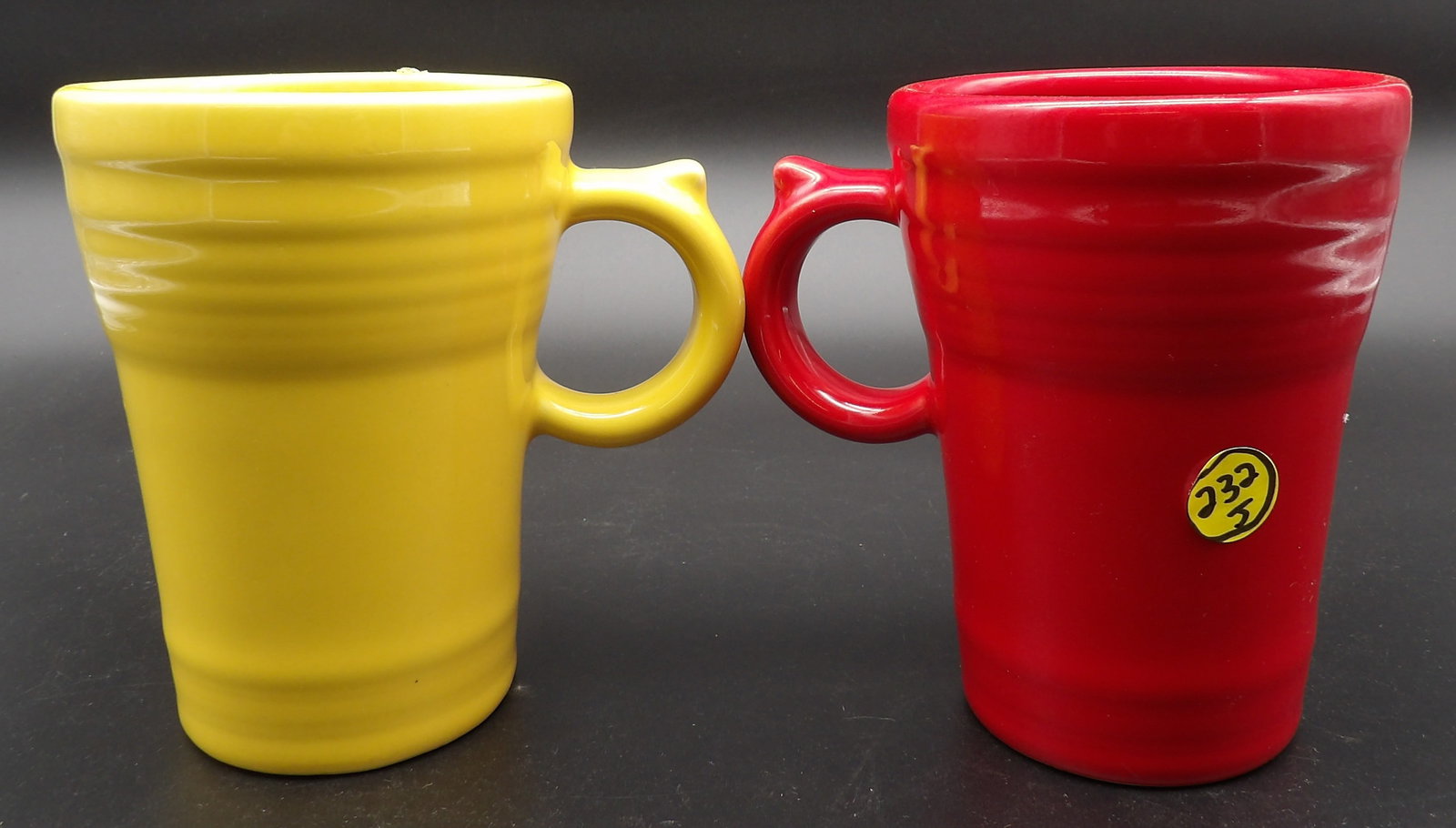 FIESTA TAPERED MUGS (2): This pair of lovely Fiestaware tapered mugs comes in Scarlet & Yellow colors