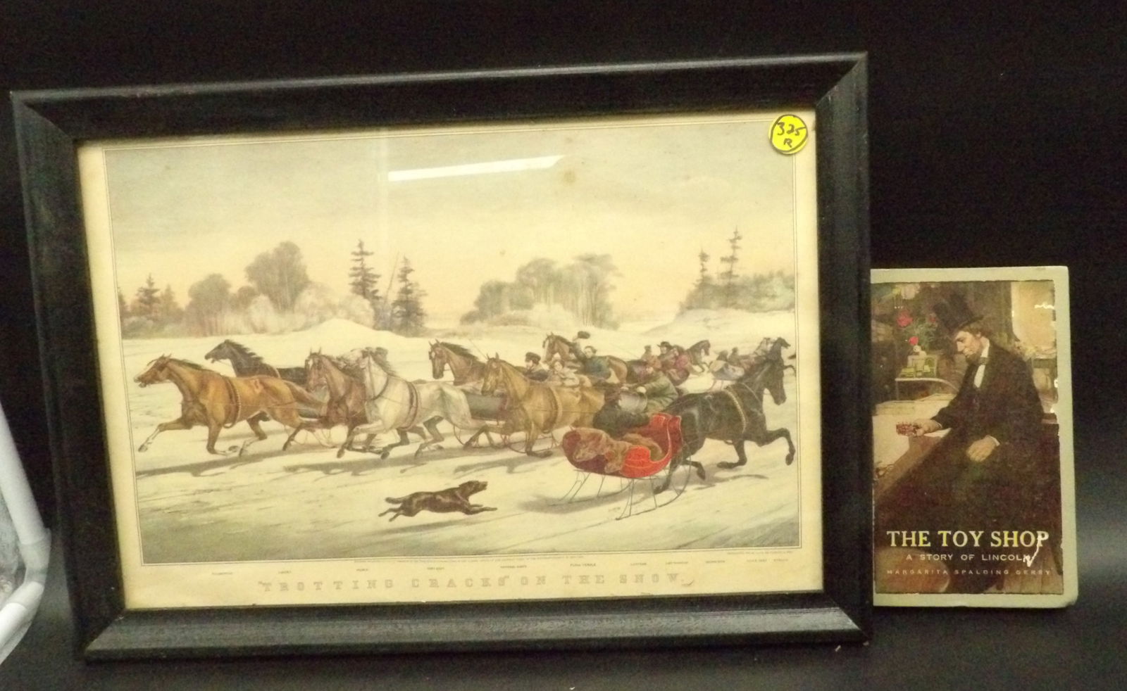 VINTAGE FRAMED ‘TROTTING CRACKS ON THE SNOW’ & ‘THE TOY SHOP: A STORY OF (1 of 3)