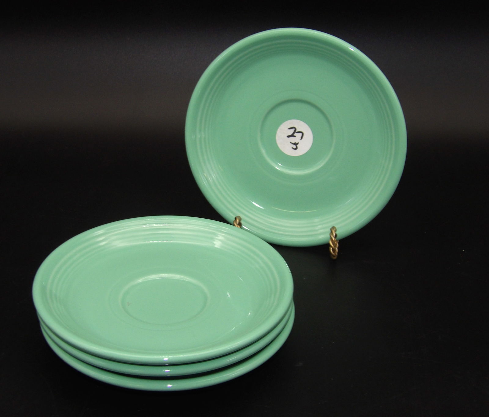 Fiesta Dinnerware Classic Rim Saucers (4) - Sea Mist Green: This lot of 4 Fiesta dinnerware classic rim plates comes in the retired Sea Mist Green glaze.Measures:6"
