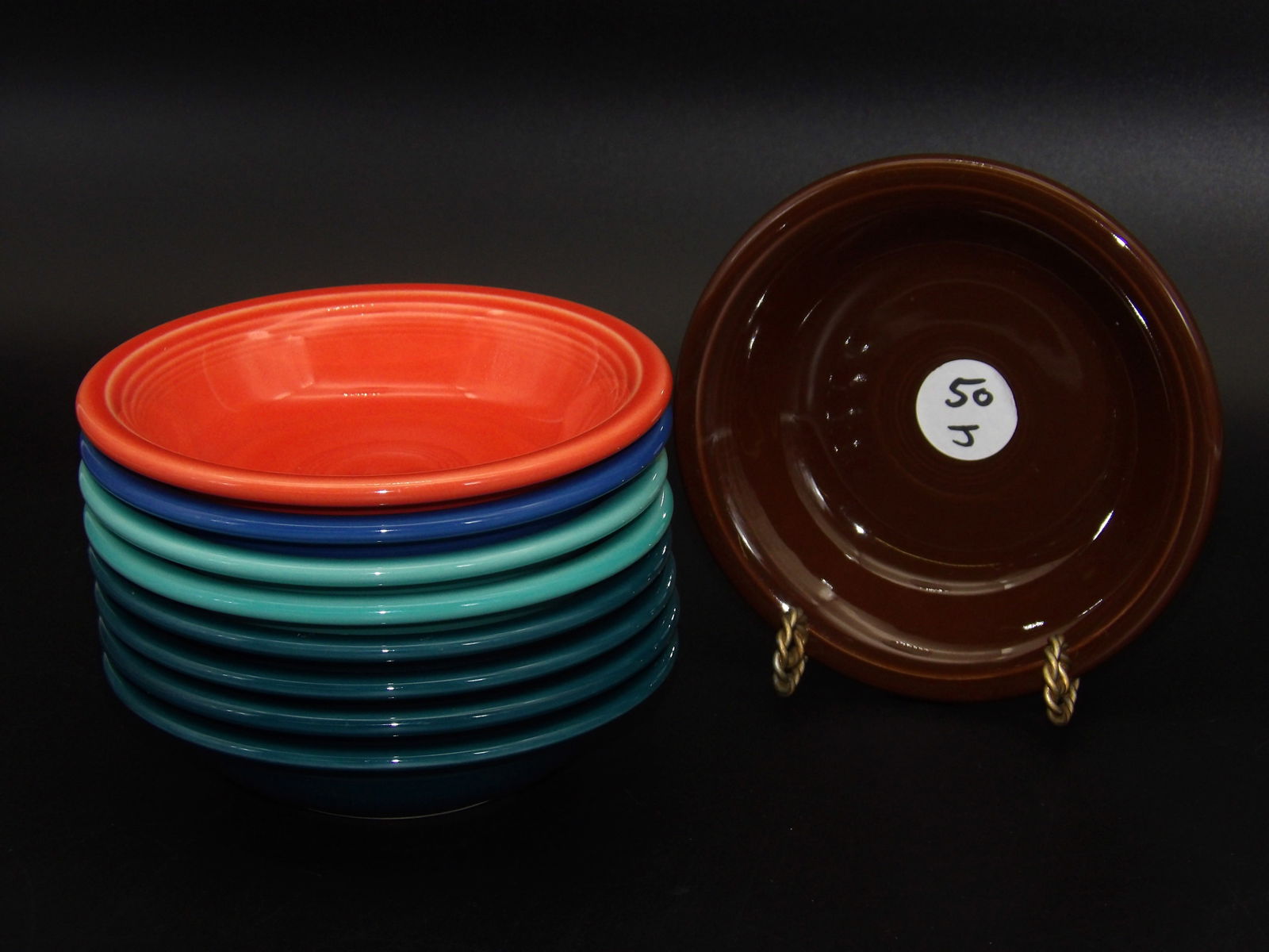 Fiestaware Dinnerware Bowls (9): This lot of 9 Fiestaware dinnerware bowls comes in Sea Mist Green, Persimmon, Peacock, Juniper, and Chocolate Brown glazes.Measures:5.5"