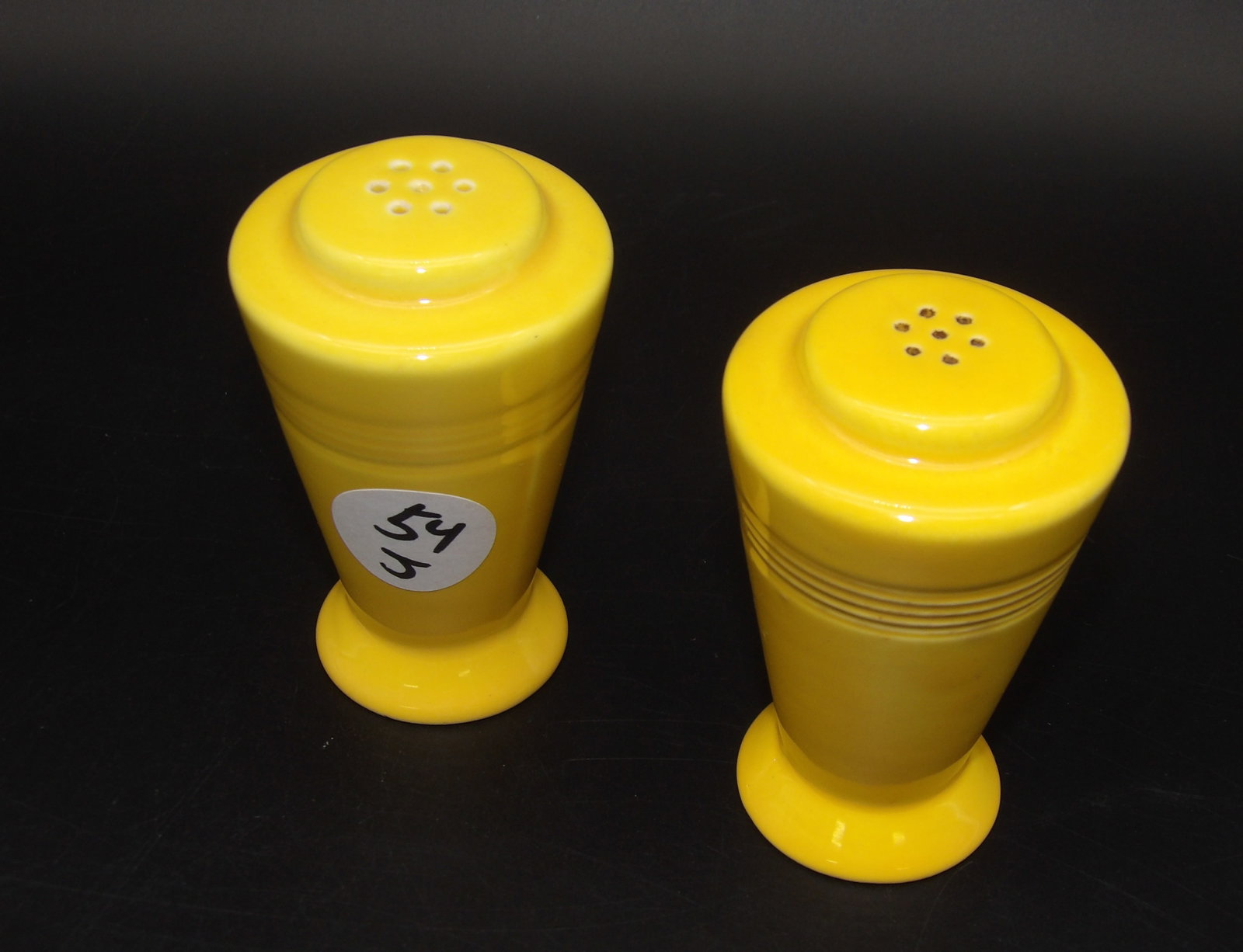 Homer Laughlin Harlequin Salt & Pepper Shakers - Yellow: This set of Homer Laughlin Harlequin salt & pepper shakers comes in the Yellow glaze.Measures:3.5" x 2"