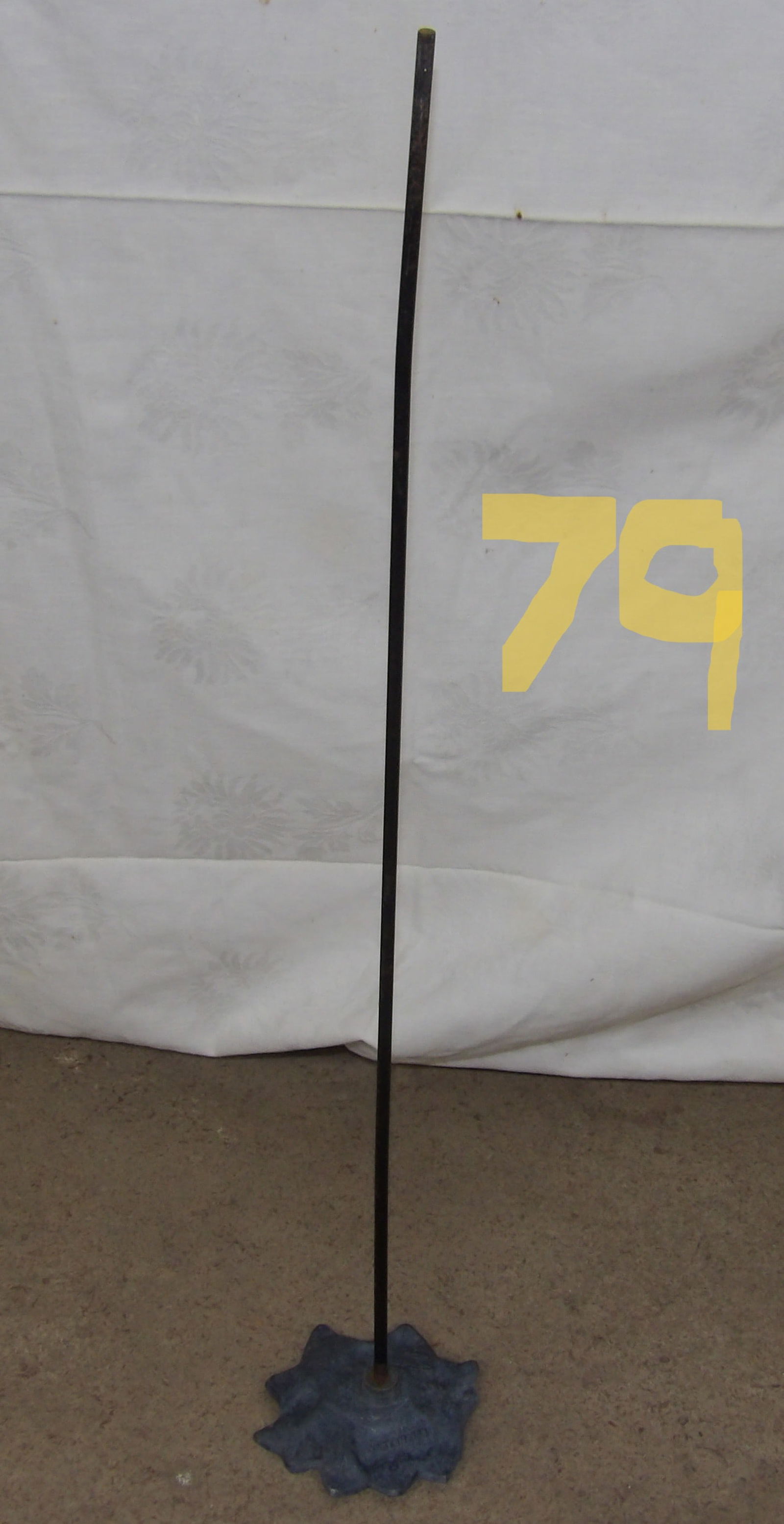 John Wright Metal Flower Lawn Sculpture: This metal flower sits atop a rod and can stand in your yard or garden. It is signed and dated by artist John Wright in 1991.Measures:31" x 5"