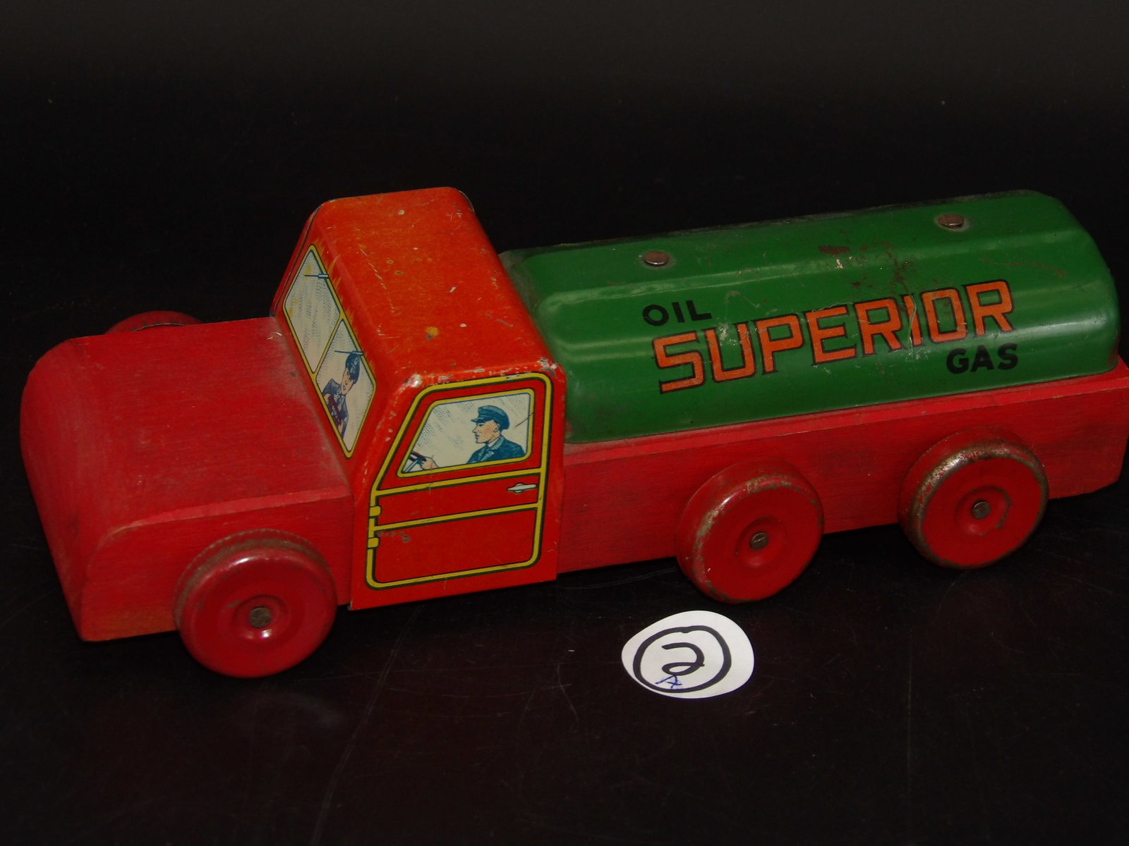 Superior Oil Gas Co. Tanker Toy Truck (War Era - Half Wood / Half Tin): This 1940's War-era tanker truck toy from Superior Oil Gas Co. is made with half tin and half wood due to the shortage of metal during WW2. MEASURES: 9" x 3.5"