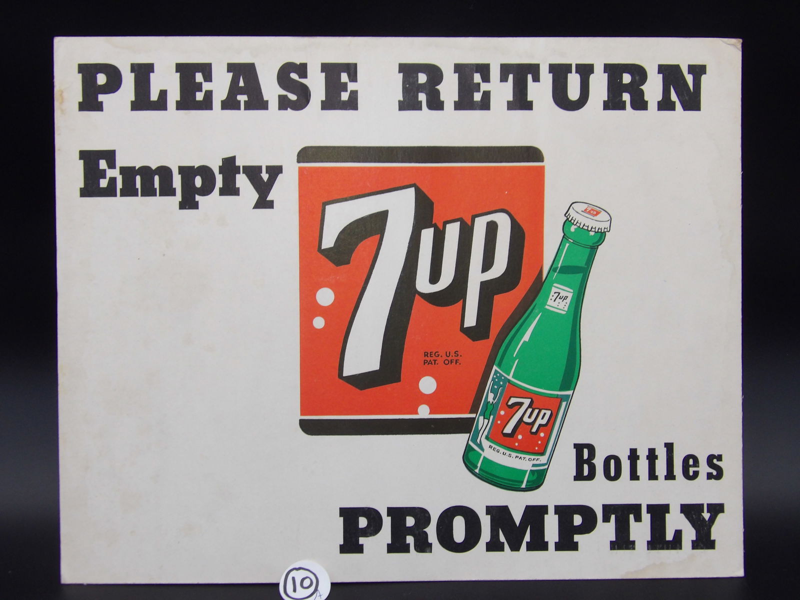 Vintage 7-Up Stand Up Advertising Sign: This vintage standing advertising sign for 7 Up reminds you to "Please Return Your Empty 7-Up Bottles Promptly". MEASURES: 14" x 11"