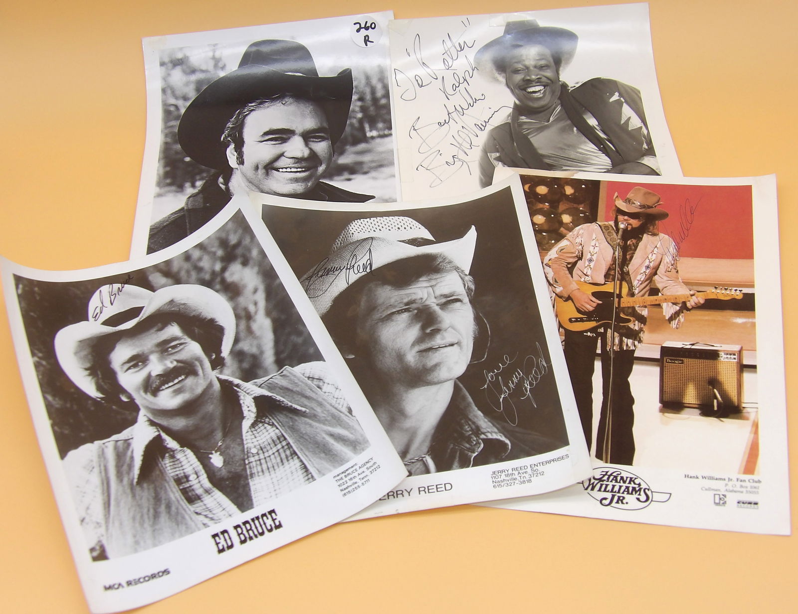 Autographed Glossy Music Photos (5) - Hank Williams Jr., Jerry Reed, Hoyt Axton, more: This lot of autographed glossy publicity photos includes desirable signatures from Hank Williams Jr., Jerry Reed, Ed Bruce, Hoyt Axton, and Big Al Downing. Measures 8" x 10", 8" x 11.5"