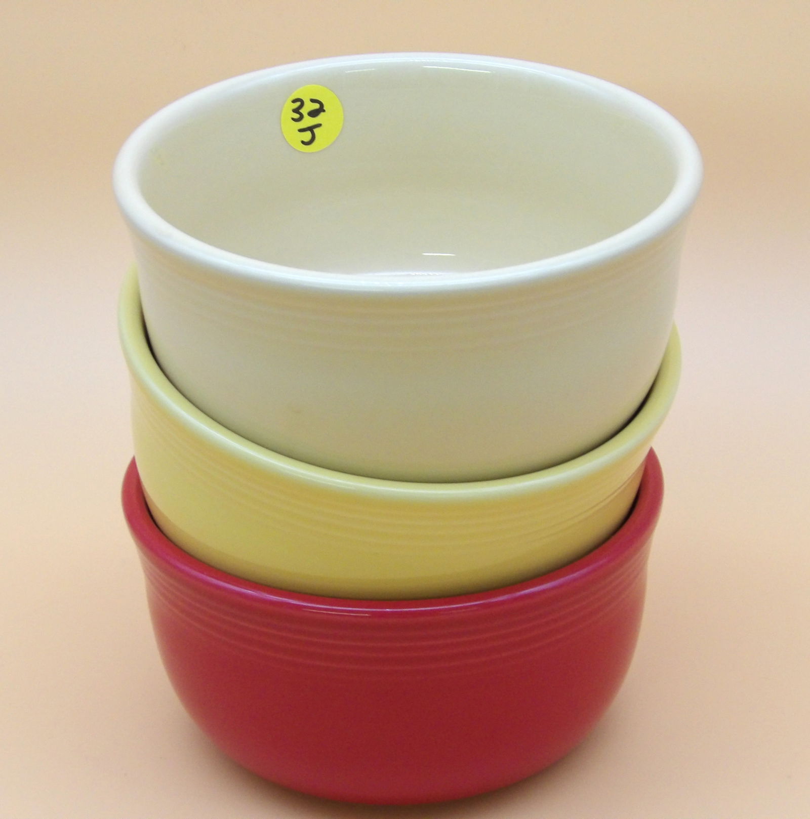 Fiestaware Gusto Bowls (3): This trio of Fiestaware Gusto bowls comes in Sunflower, Scarlet, and Ivory glazes. Modern era. Measures: 6" x 3" each.