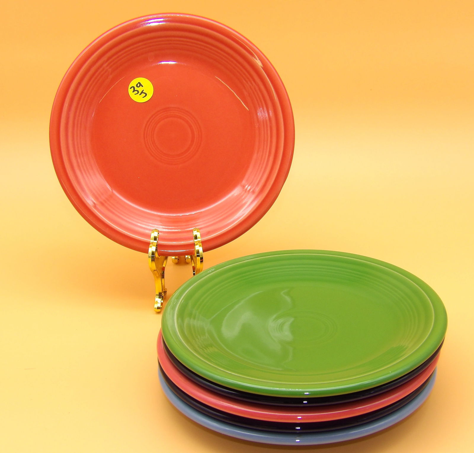 Fiestaware Plates (6): This lot of 6 Fiestaware plates comes in Cobalt, Shamrock, Tangerine, Rose Pink, and Periwinkle glazes. Modern era. Measures: 7" each