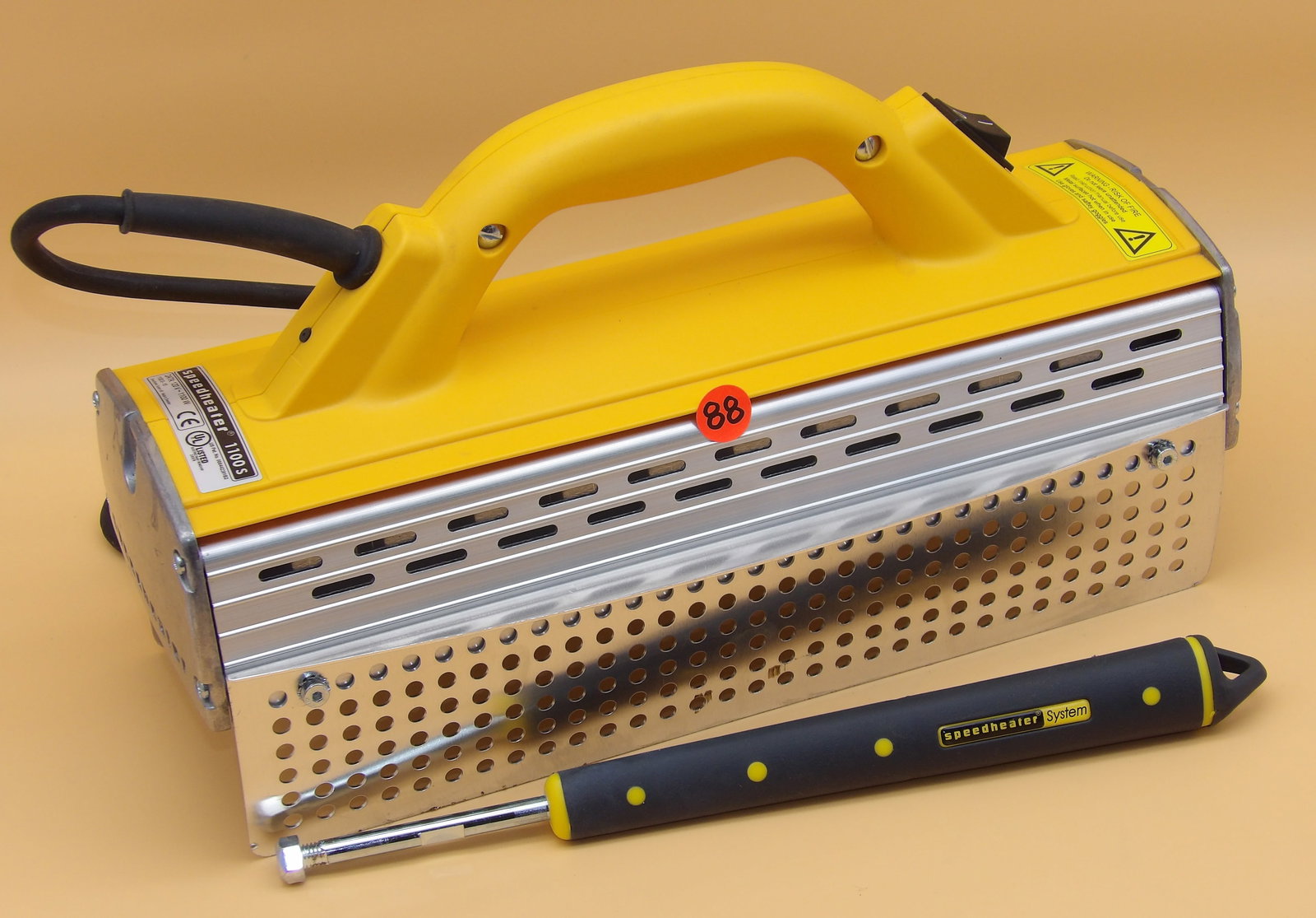 Speedheater System IR Paint Remover: This SpeedHeater System IR paint remover includes scrapers. In box. Measures: 10" x 15.5" x 7.5"