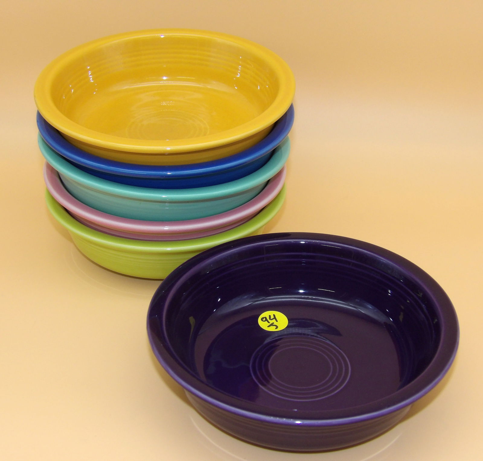 Fiestaware Bowls (6): This collection of 6 modern-era Fiestaware bowls comes in Plum, Rose, Sea Mist, Periwinkle, Sunflower, and Lemongrass glazes. Measures: 7" x 2" each.