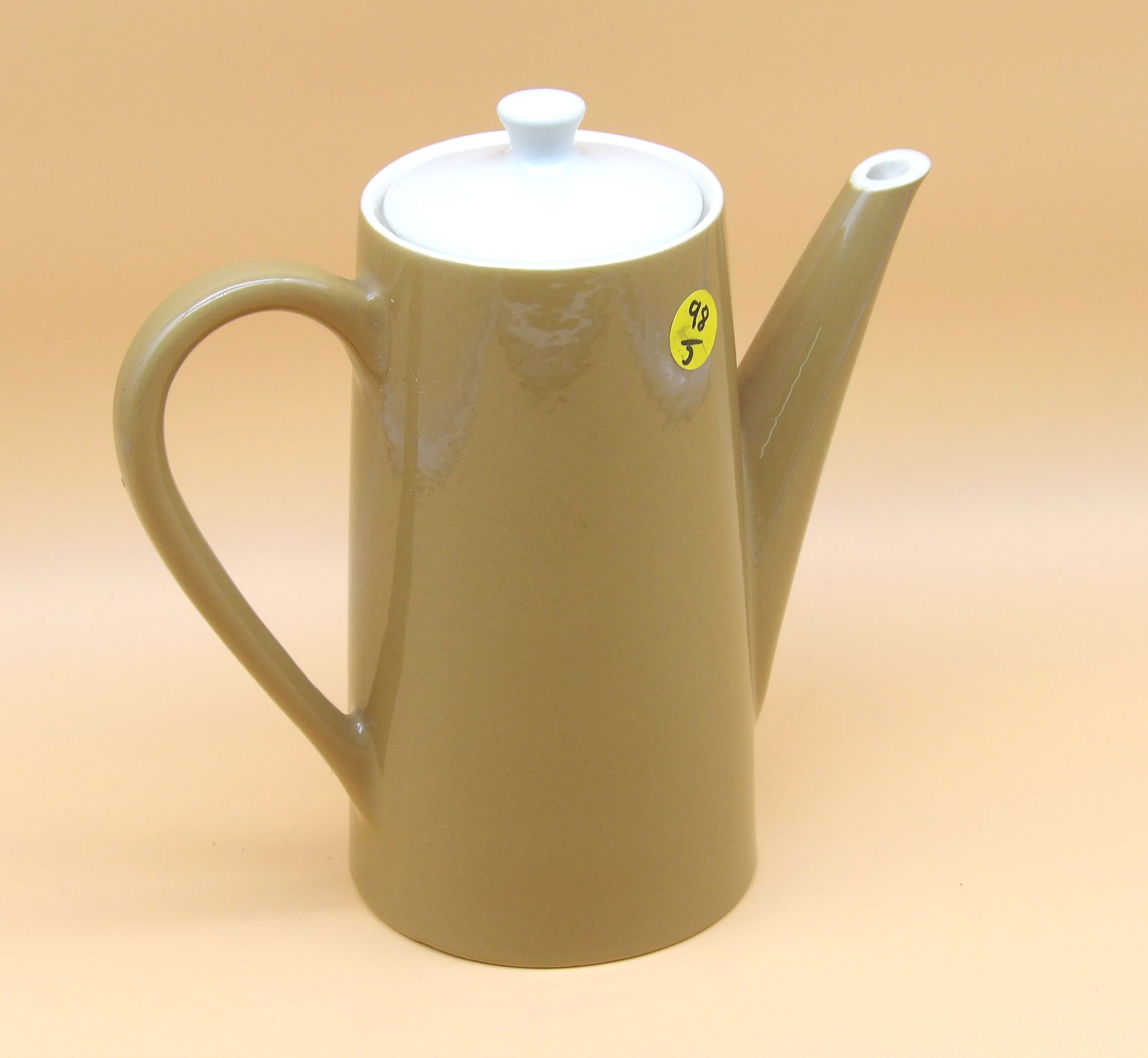 Royal China Star Glow Futura Coffee Pot: This sleek and stylish Royal China Star Glow coffee pot comes in the popular 'Futura' style. 1960's. Measures: 9" x 9" x 3.5"