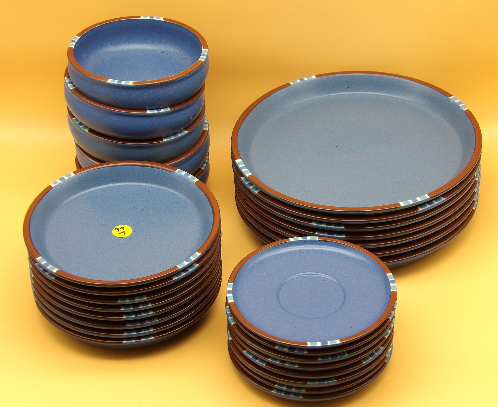 Mesa Dansk Blue Stoneware Set (28 pcs): This 28 piece Mesa Dansk blue stoneware set includes 5 bowls, 8 saucer plates, 8 small plates, and 7 large plates. Measures: 2" x 5.5" // 6", 7.5" & 10.5"