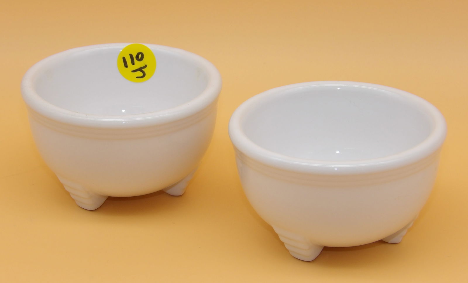 Fiesta Footed Salsa Dishes (2): This pair of vintage Fiestaware footed salsa/dipping dishes comes in white glaze. Measures: 2" x 3.5"