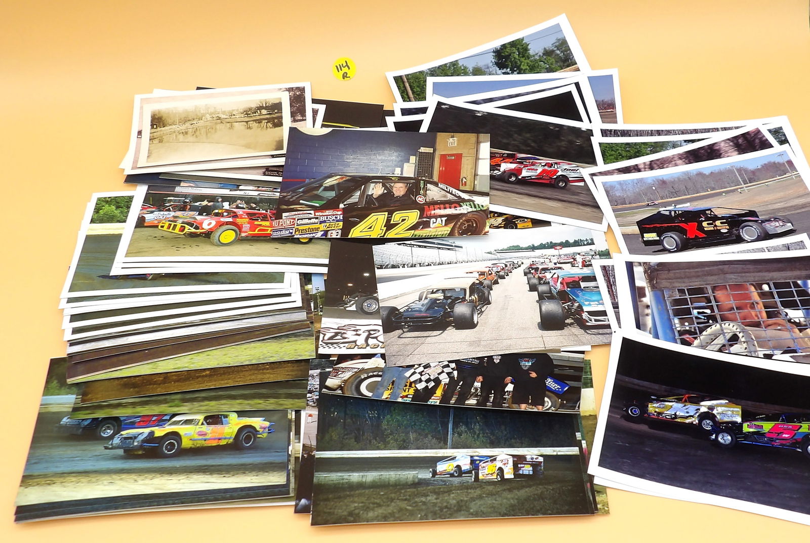 Racing & Car Photo Lot: This lot includes racing car photos organized in a plastic file case. 1990's/2000's. Measures: 6.5" x 8.5" x 5"