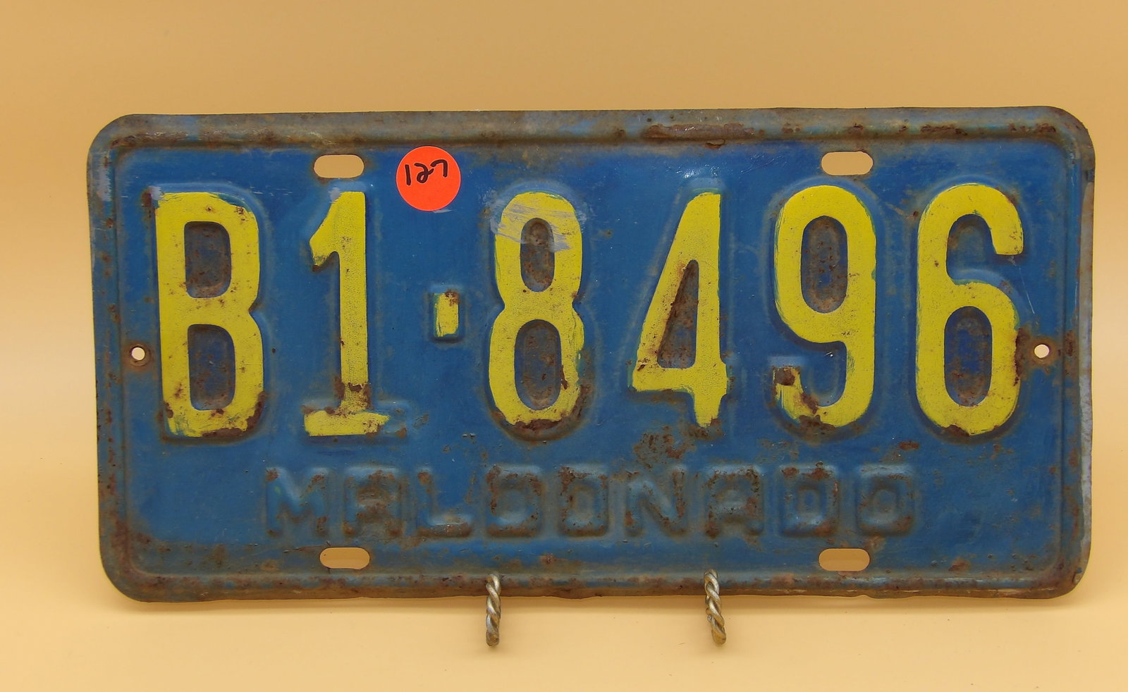 Vintage License Plate: This vintage license plate is from a 1930 Ford issued in Maldanado, Uruguay. Measures 12" x 6"