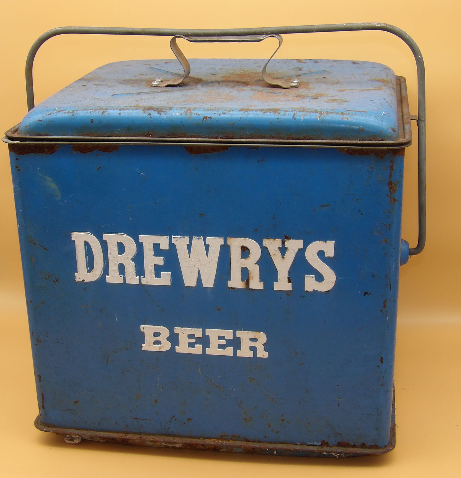Drewry's Beer Embossed Metal Cooler: This vintage embossed metal cooler advertising Drewry's Beer has wear/rust, but is sturdy and intact. Great for display! 1950's / 60's. Measures 16" x 12" x 14.5"