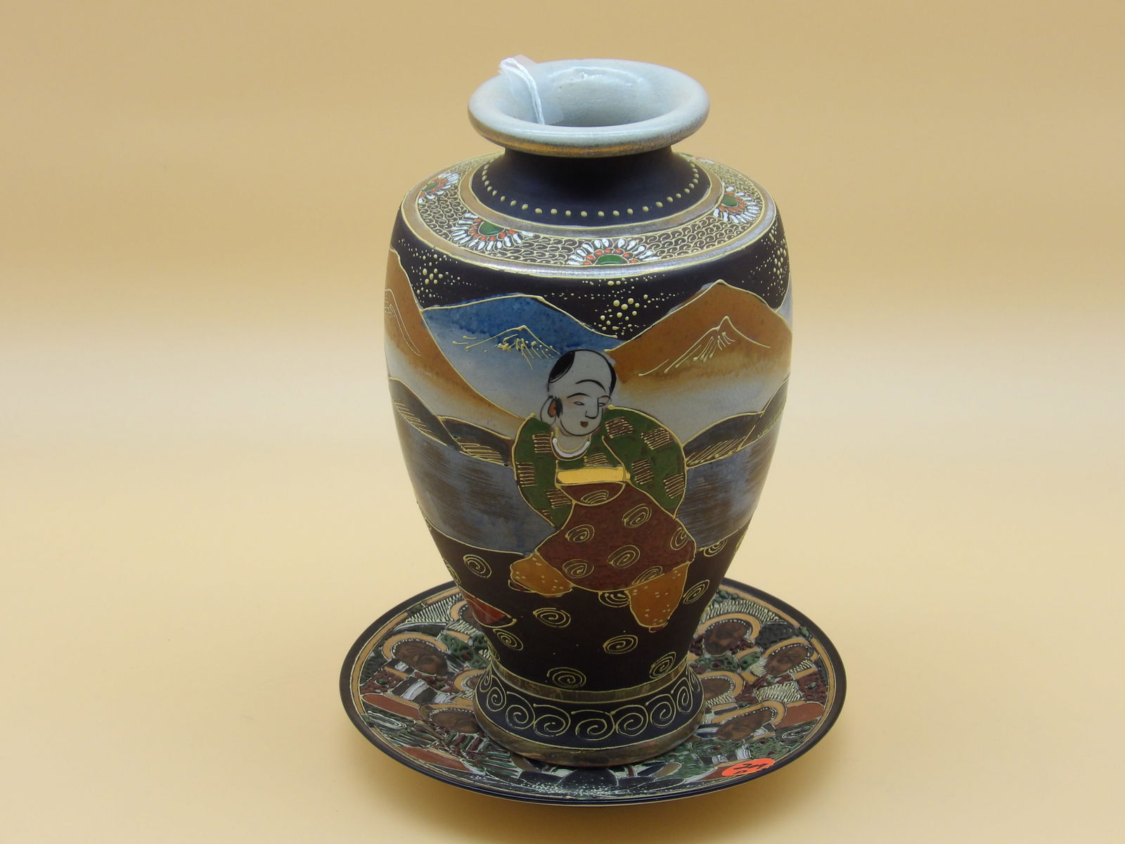 Satsuma-Style Moriage Vase and Nippon Handpainted Dish: This exotic pair includes a Satsuma-style hand painted Moriage Vase (10" x 5") and a Nippon hand painted dish that dates to the 1920's (7.5").