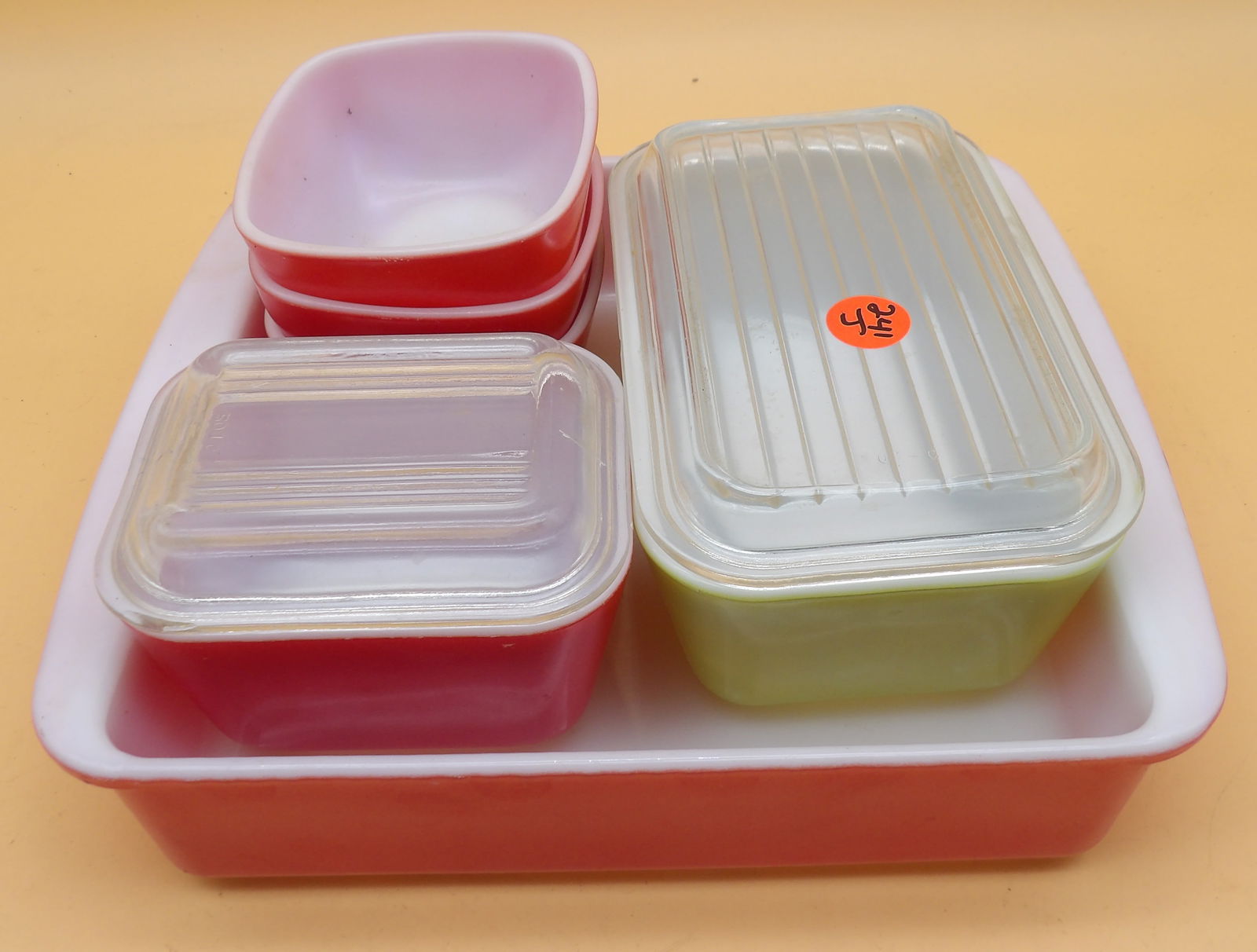 Pyrex Lot - Baking Dish, Refrigerator Dish, Serving Bowls (6 pcs): This 6-piece vintage Pyrex lot includes a Flamingo Pink 8-Inch Baking Dish, a 501 Red Lidded Refrigerator Dish (1.5 cups), a Yellow Lidded Refrigerator Dish (1.5 pints), and 3 Red Square 'Hostess'
