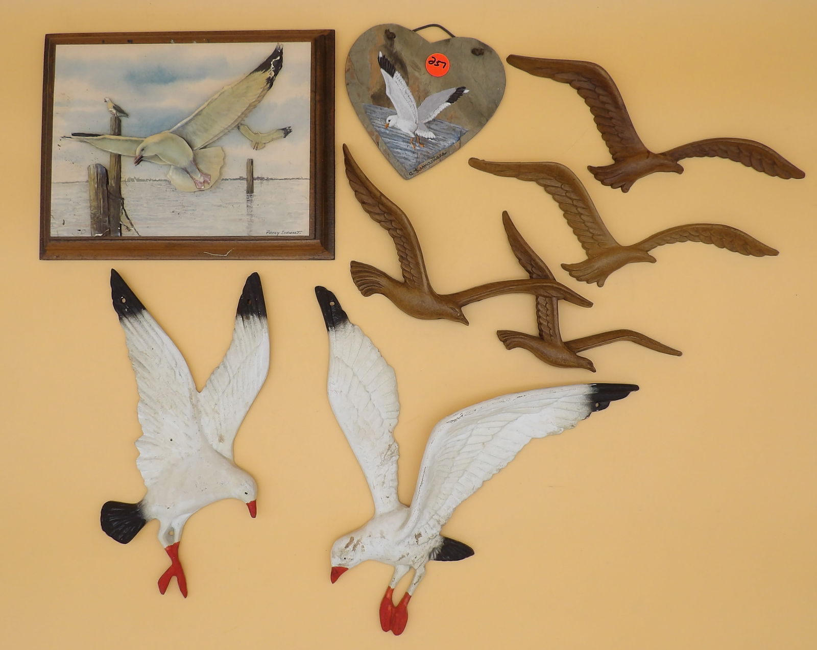 Seagull Wall Hanger Lot (7 pcs): This lot of seagull wall hangers includes 2 metal, 3 plastic, a 3D-style plaque, and a heart-shaped plaque. Measures 9.5" x 9.5", 12" x 5", and 7.5" x 9"
