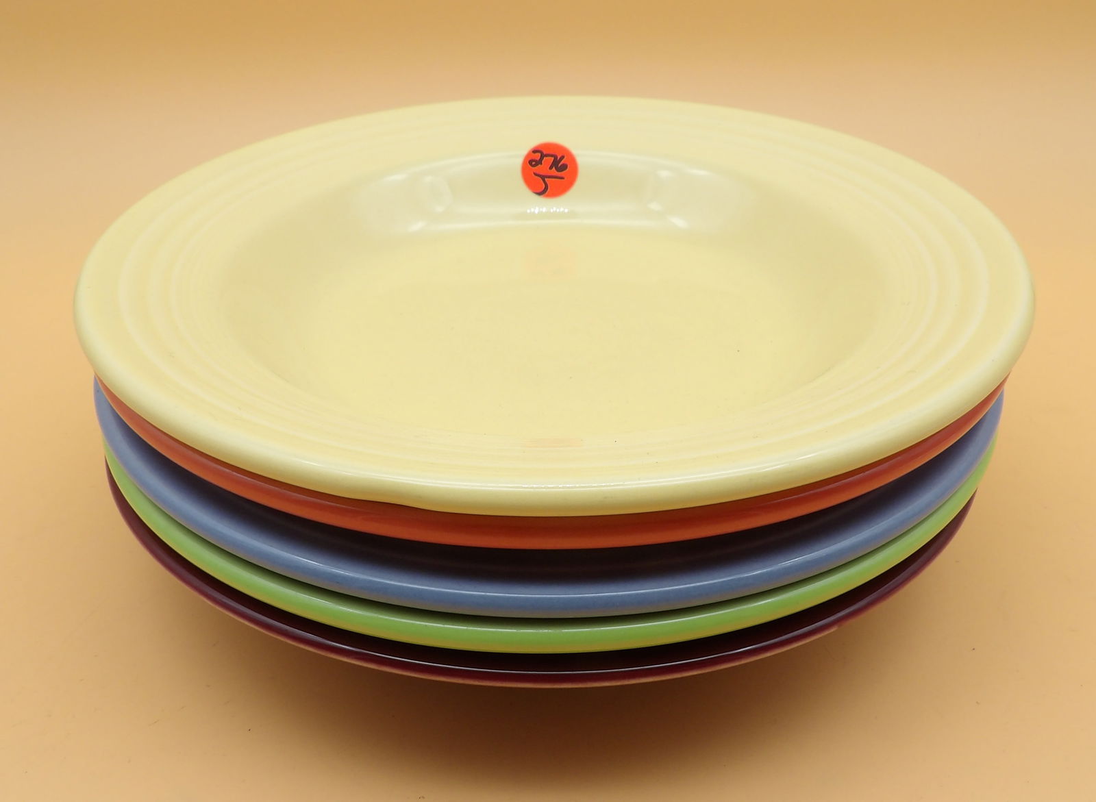 Fiestaware Bowls (5): This lot of 5 modern-era Fiestaware bowls comes in Yellow, Periwinkle, Sea Mist, Persimmon, Chartreuse, and Cinnabar glazes. Measures 1.5" x 9" each