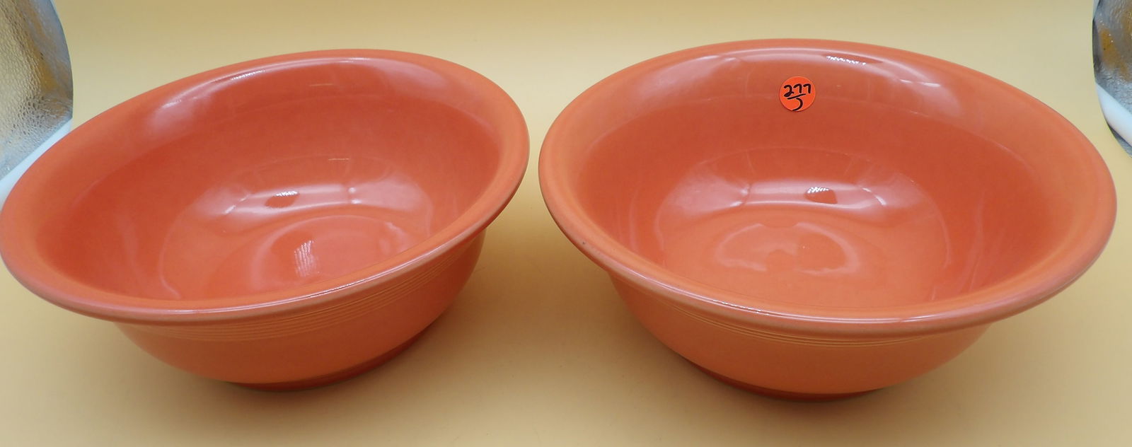 Fiestaware Fruit Bowls (2): This pair of modern-era Fiestaware bowls comes in Persimmon colored glaze. Measures 3.5" x 9" each.