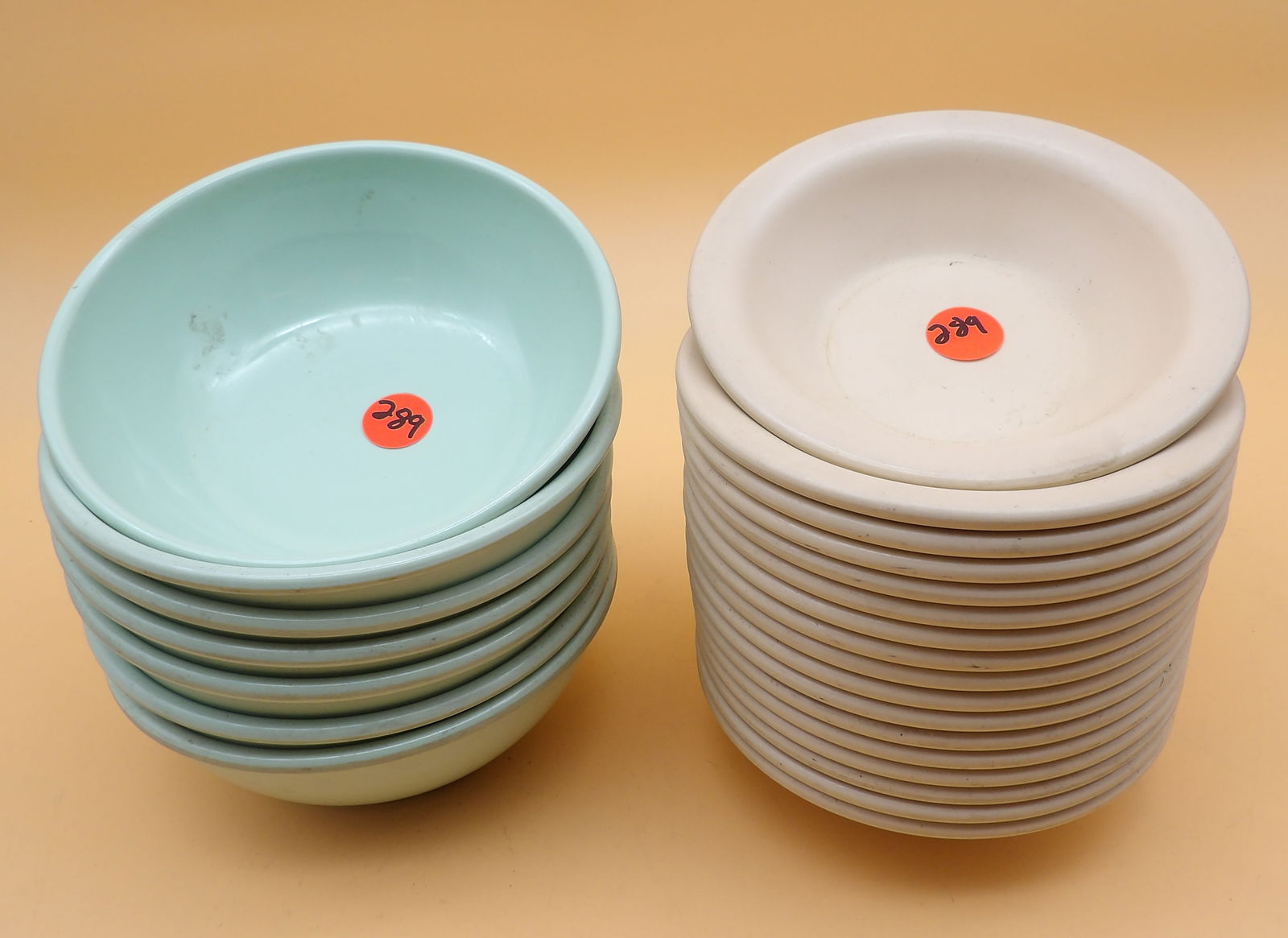 Arrowhead Plastic Bowls (24): This lot of plastic Arrowhead bowls includes seventeen 1" x 5" and seven 2" x 5.5" bowls. 1960's.