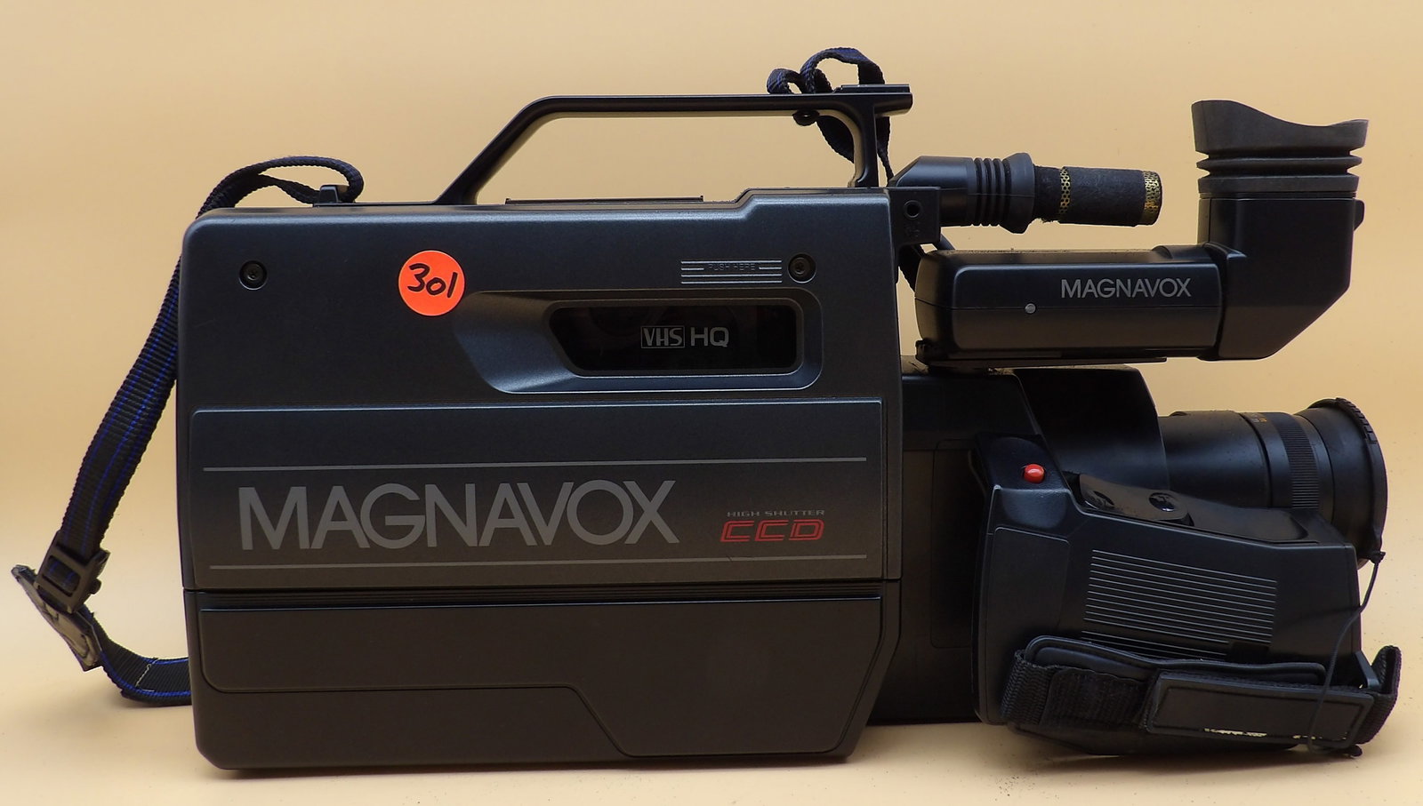 Magnavox VHS Movie Camera w/ Case and Accessories: This Magnavox 1J3110AV01 VHS Movie Maker Camcorder is in new condition and includes a battery pack, charger, various wires for hook up and AV, a fresh VHS tape, and a soft-shell carry case.