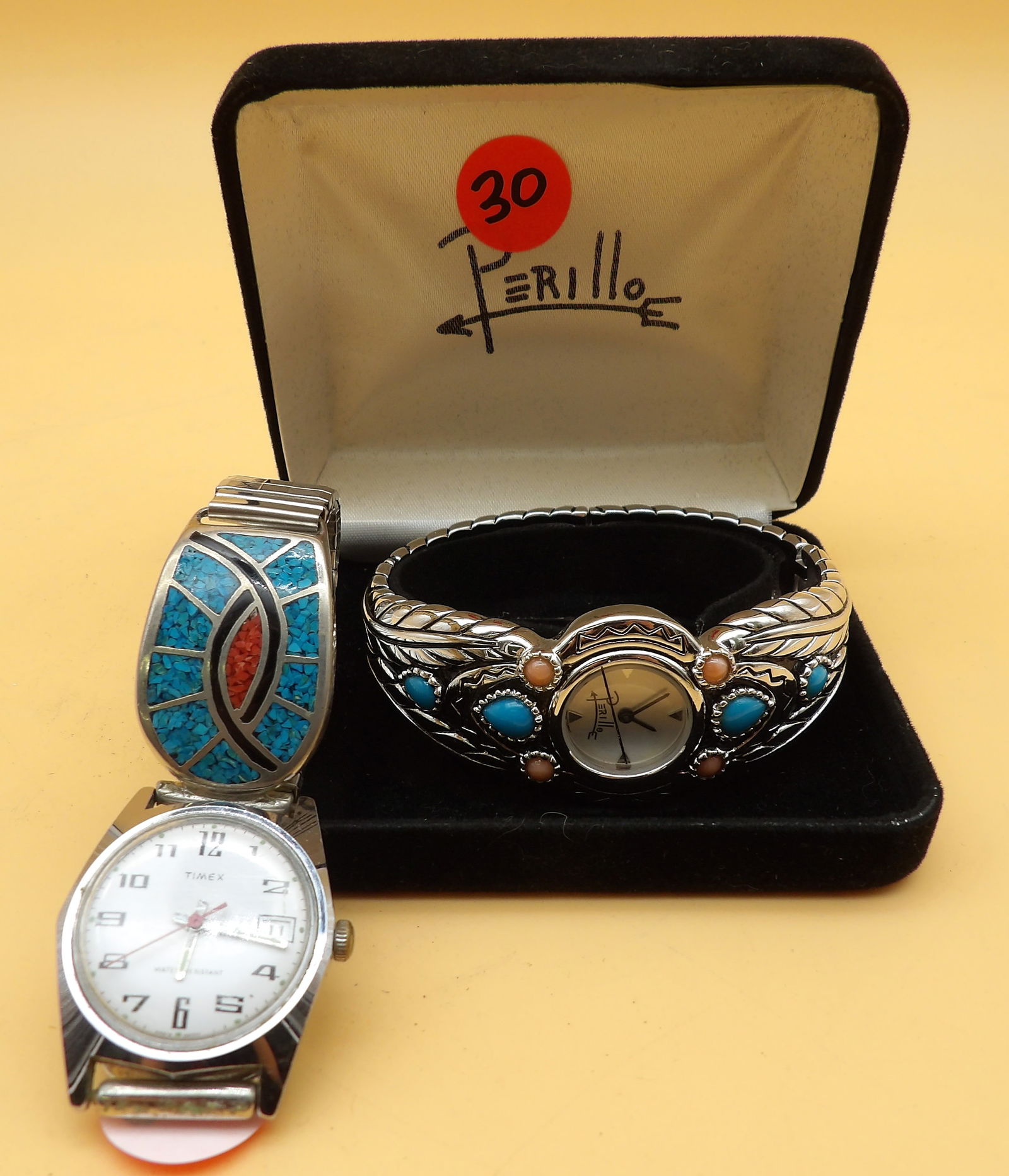 Southwestern Native Perillo Cuff Watch & Navajo-Style Cuff Bracelet Timex Watch: This pair of stylish Southwestern inspired watches includes a Perillo Cuff Watch w/ turqouise and coral, includes case (4" x 4" x 1.5") and a Navajo-style cuff bracelet Timex watch in working