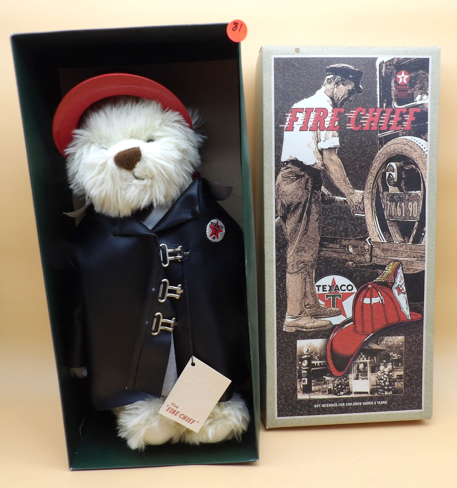Texaco Fire Chief Teddy Bear: This Texaco Fire Chief teddy bear is new (with tags) in original box. It is the 3rd edition from 1999. Measures 6" x 18" x 8.5"