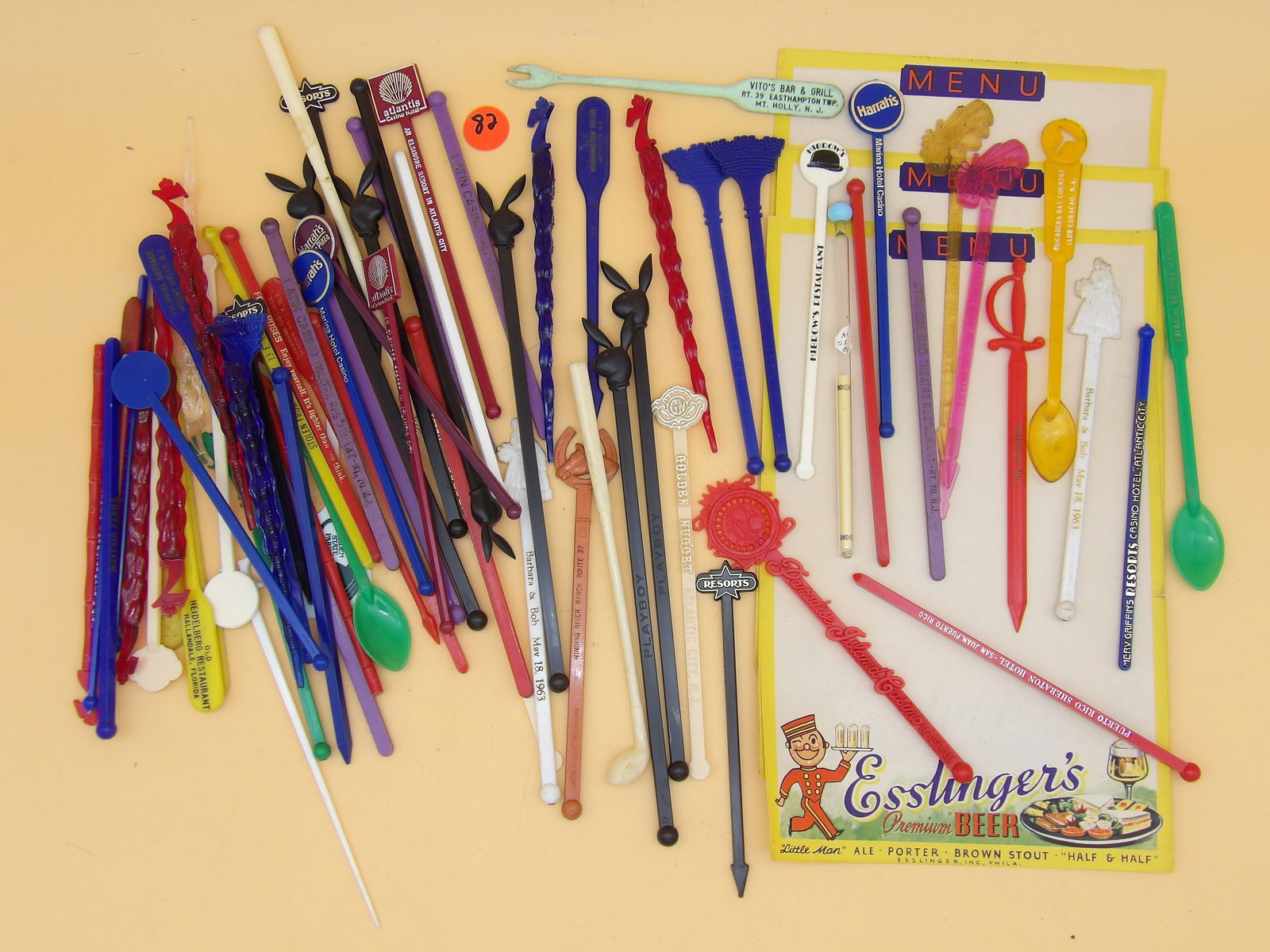 Vintage Drink Stirrers & Esslinger Beer Blank Menu Sheets: This bar lot features 5 blank Esslinger Beer menu sheets (10" x 6"), and over 70 vintage drink stirrers/swizzle sticks from casinos , Playboy, Seagram's 7, Puerto Rico, Atlantic City, Florida, and