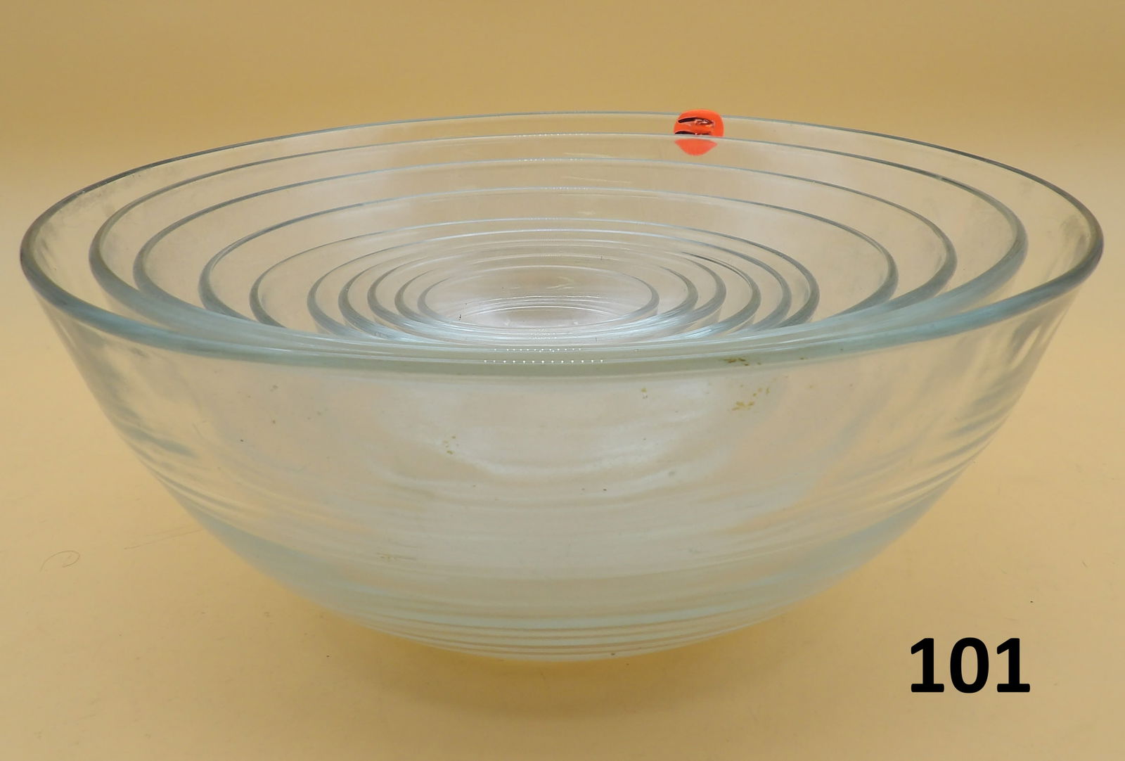 Duralex Nesting Mixing Bowl Set (10 pcs): This set of Duralex Nesting Mixing Bowls features 10 glass bowls of incrimental size that 'nest' inside eachother for storage. Largest measures 10" x 4". Mid 20th Century
