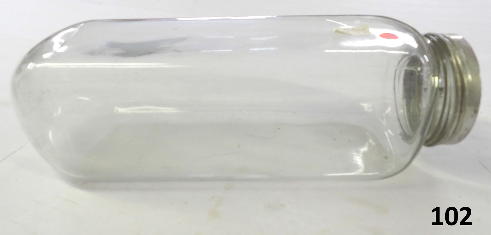 Aridor Glass Market Jar: This huge (20" x 6" x 6") round bottom Aridor jar was originally used to display goods at market or at a general store. Late 19th Century. Some damage to lid (see photos), but it is intact.