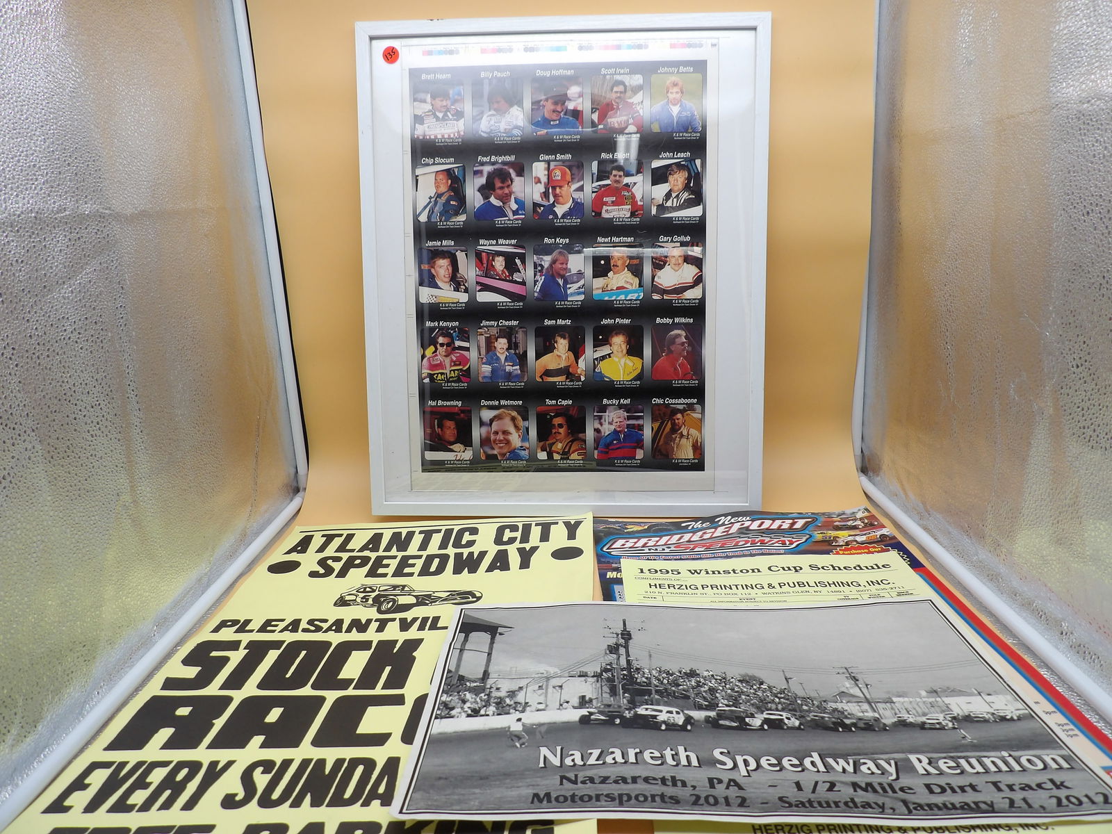 Vintage Racing Posters (5): Get the need for speed with this 5 piece Vintage Auto Racing poster lot. Included are an Atlantic City Speedway Stock Car Races poster, a K & W Race Cards Driver Lineup (framed), a 1995 Winston Cup