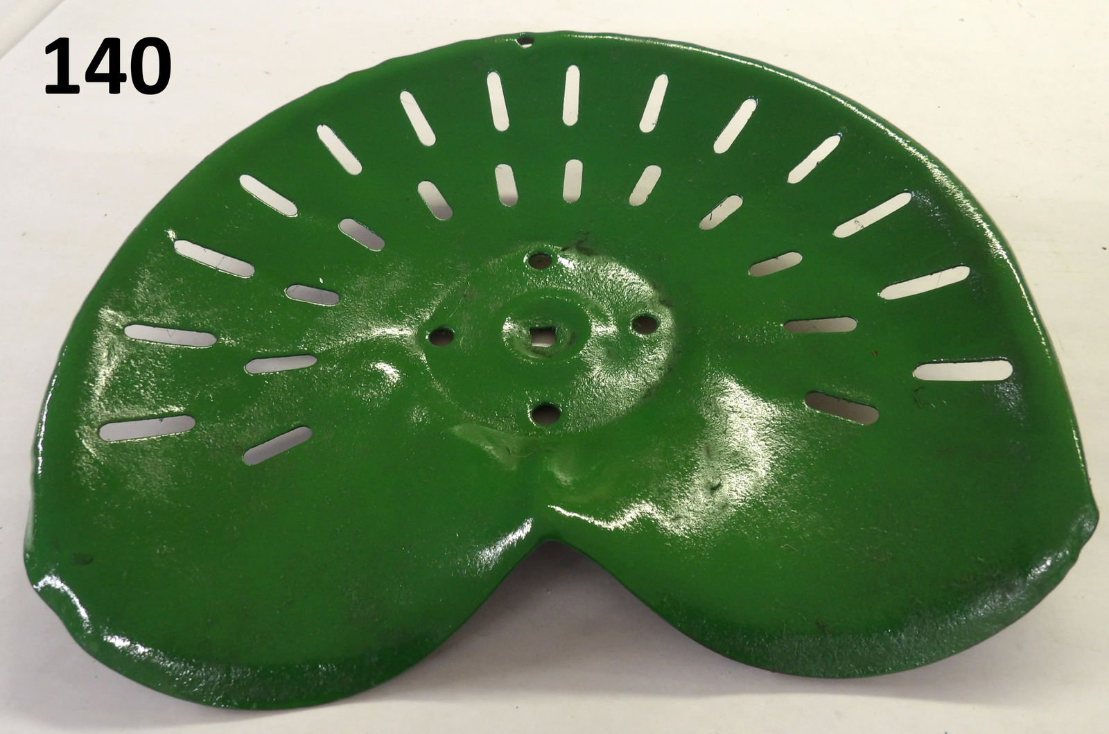 John Deer - Style Tractor Seat: This vintage iron tractor seat is painted John Deer green. Measures 16.5" x 13.5" x 3".