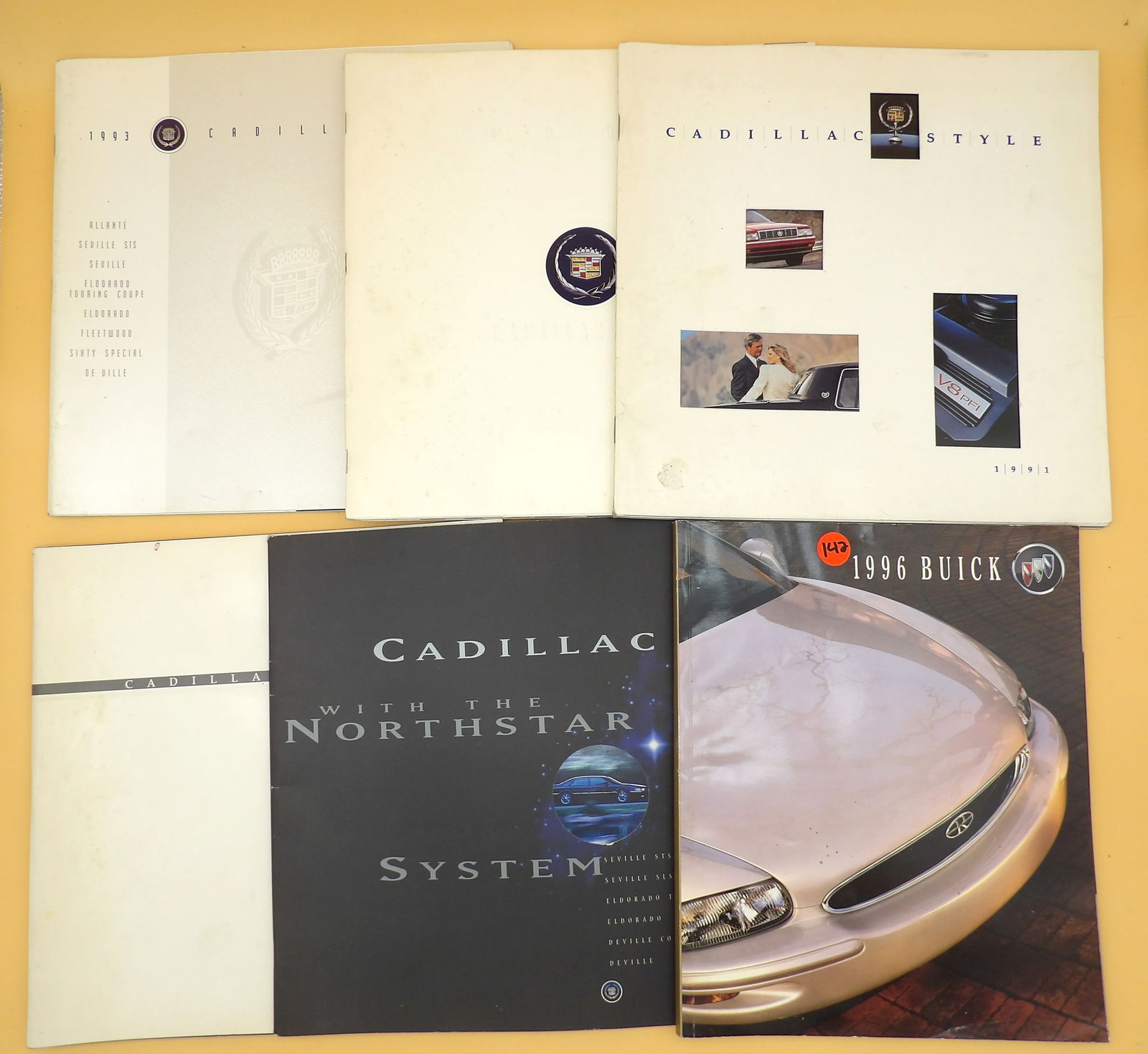 Cadillac / Buick Sales Catalogs / Info Books (6): This collection of vintage sales catalogs includes 5 Cadillac and 1 Buick. Includes: 1996 Buick, 1996 Cadillac w/ Northstar System, 1990 Cadillac Style, 1993 Cadillac, 1992 Cadillac Style, 1991