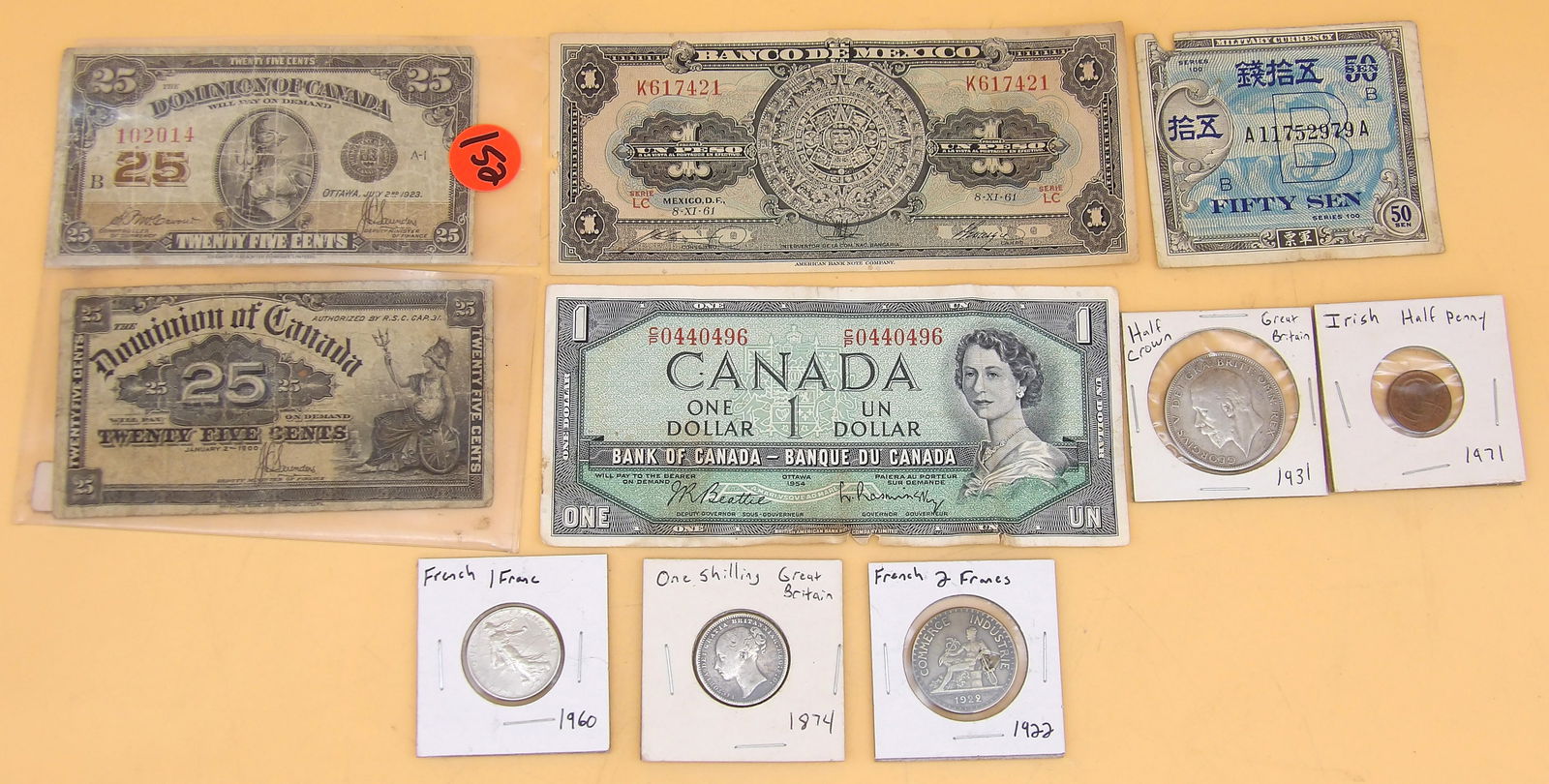 International Paper Money & Coins (10 pcs): This collection of international money includes Occupied Japan Military Currency 50 Sen (wear on edge of bill), two Dominion of Canada 25 cent bills (1900 & 1923), 1954 Canada $1 Bill (wear), Mexico