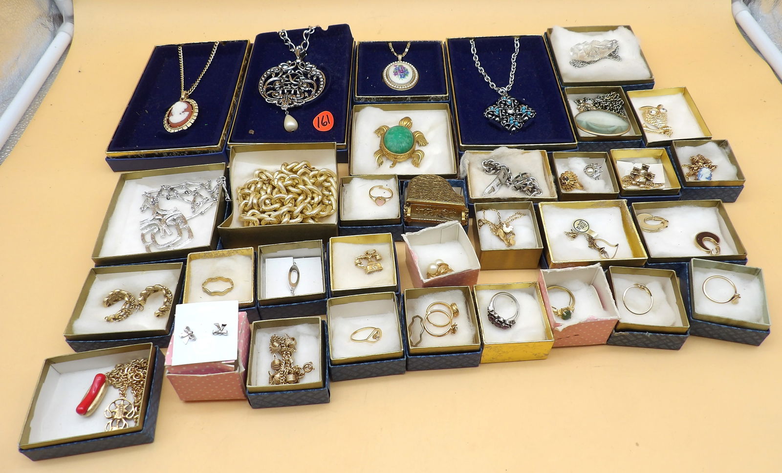 Avon Jewelry Lot (Over 35 pcs): This Avon Jewelry lot includes rings, necklaces, pendants, earrings, pins, and more. Over 35 pieces.